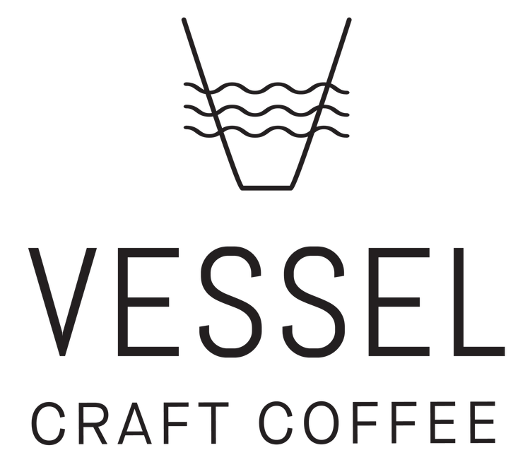 Logo for Vessels Craft Coffee featuring a stylized coffee cup with waves and lines above, and text reading 'Vessel Craft Coffee'.
