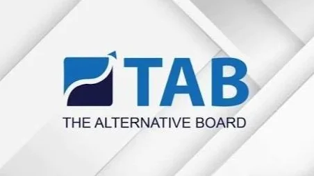 Logo with the word 'TAB' and the slogan 'The Alternative Board' on a modern gray and white background.