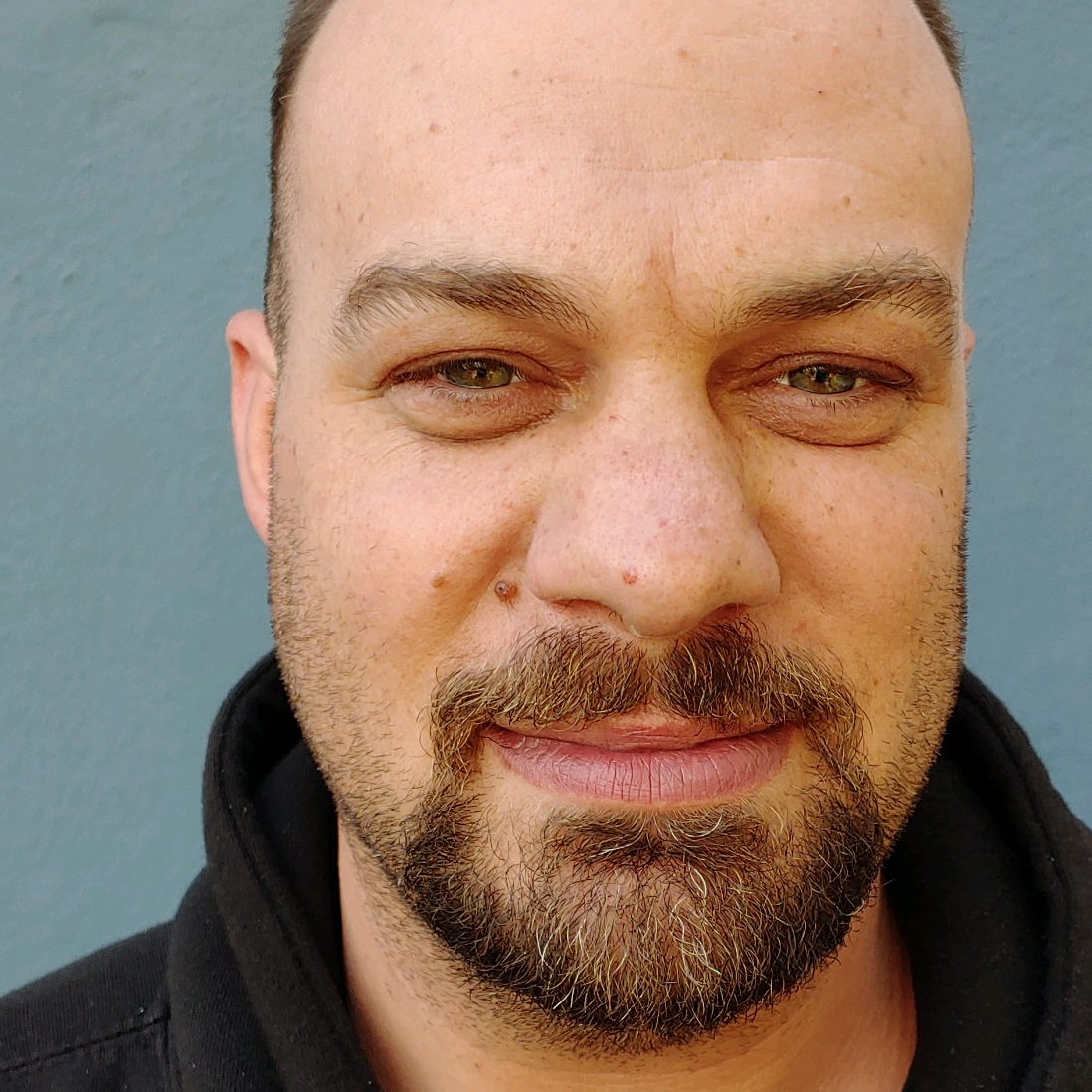 Portrait of Ted, the lead HVAC installation technician at Bodnar HVAC with over 10 years of service, representing a heritage of multi-generational craftsmanship in the Mid-Peninsula.