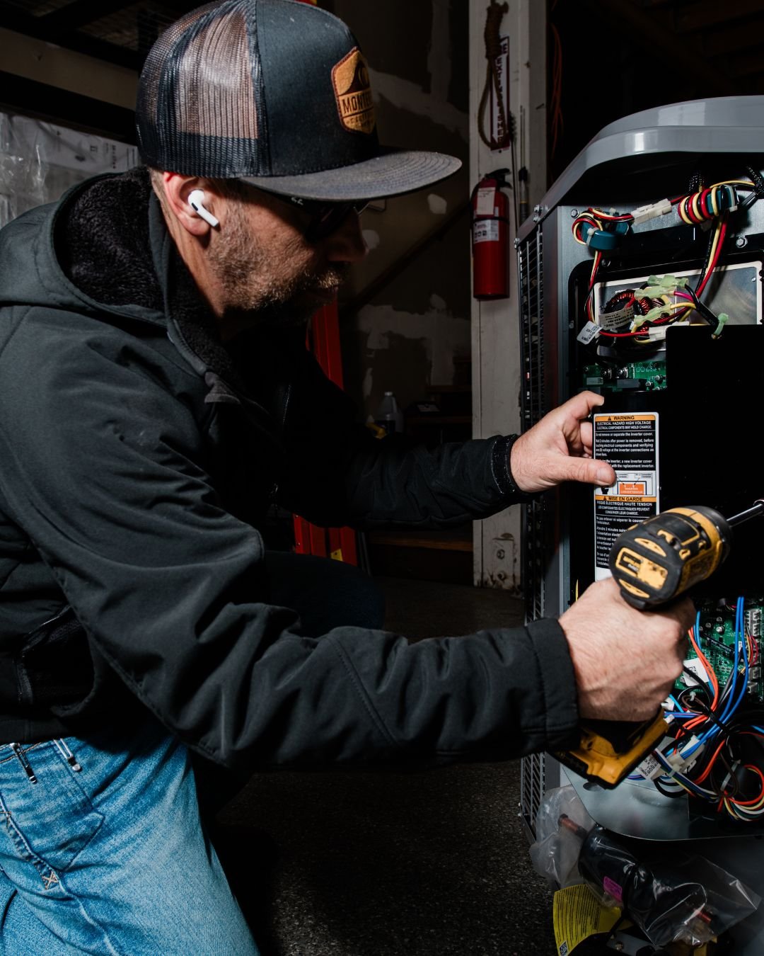 Third-generation HVAC expert John Bodnar providing his repair-first approach to a cooling system.