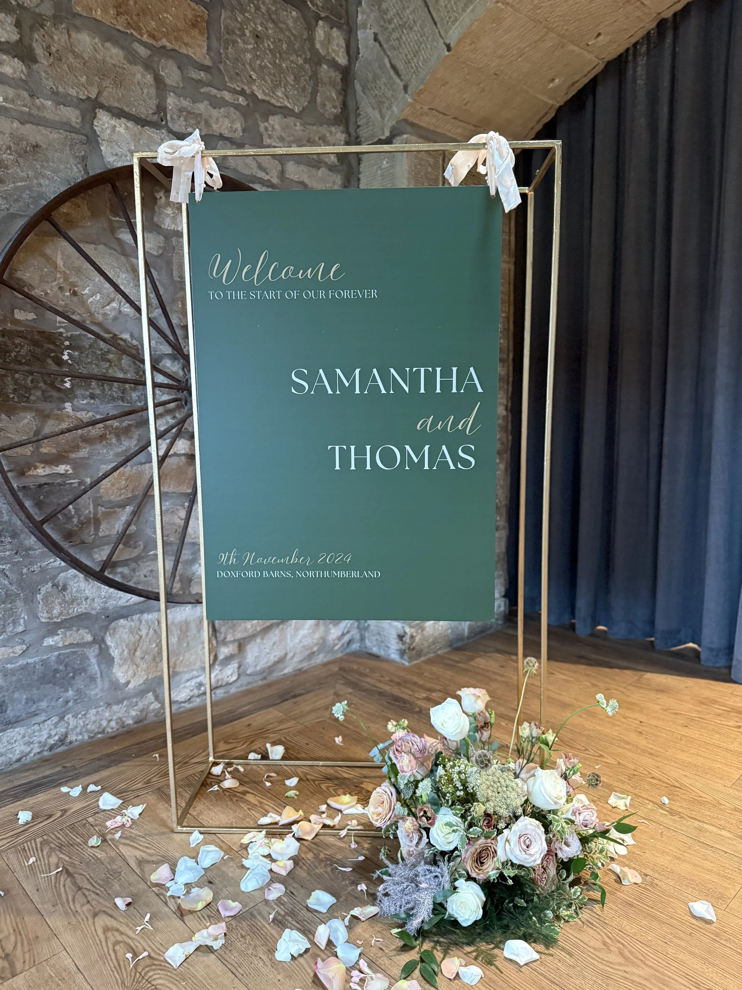 Flower cloud for welcome signage - continuing the flow of the floral designs throughout the day
