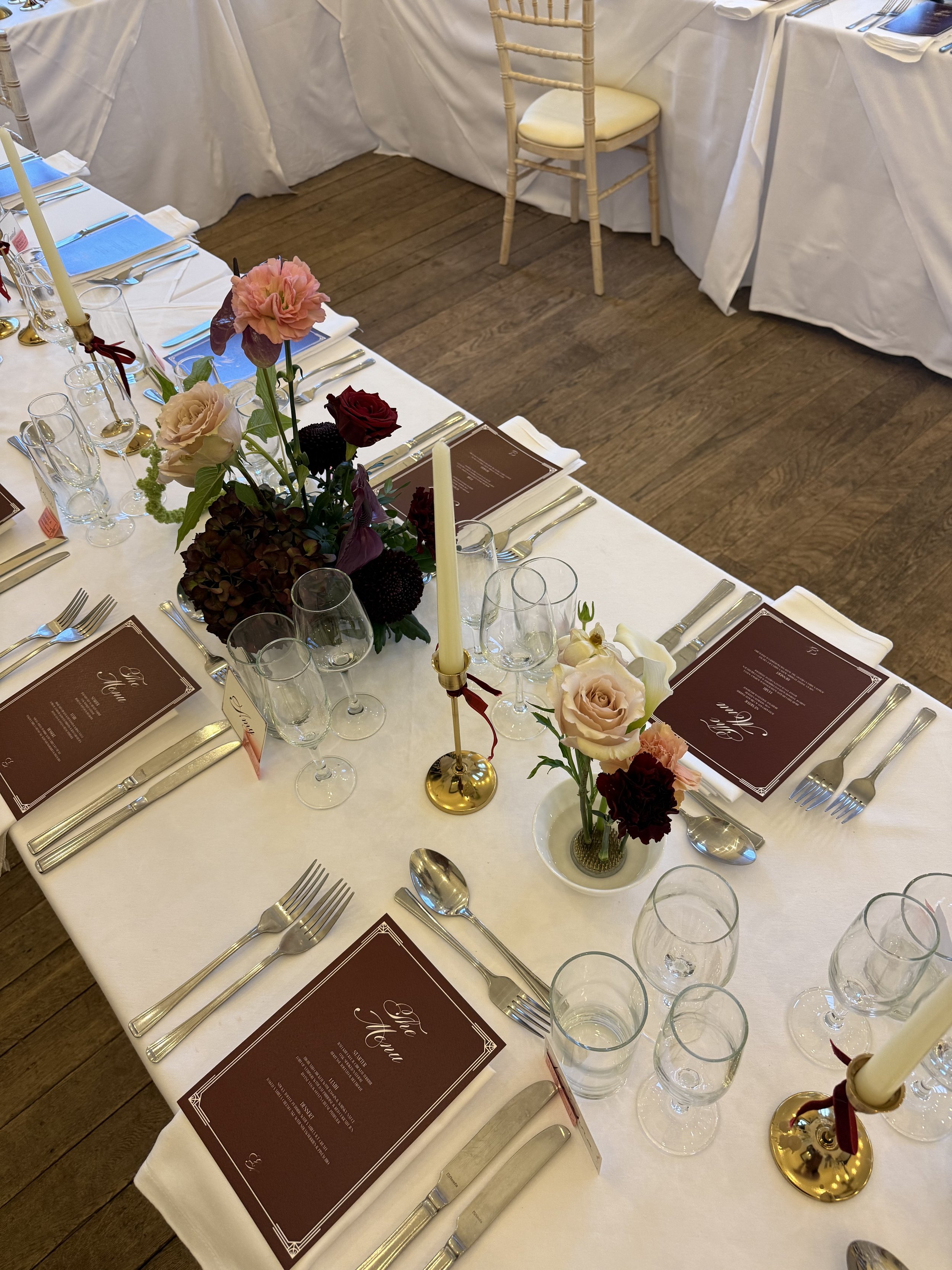 A combination of flower clouds, bud vases and ikebana florals for tables to add depth and dimension