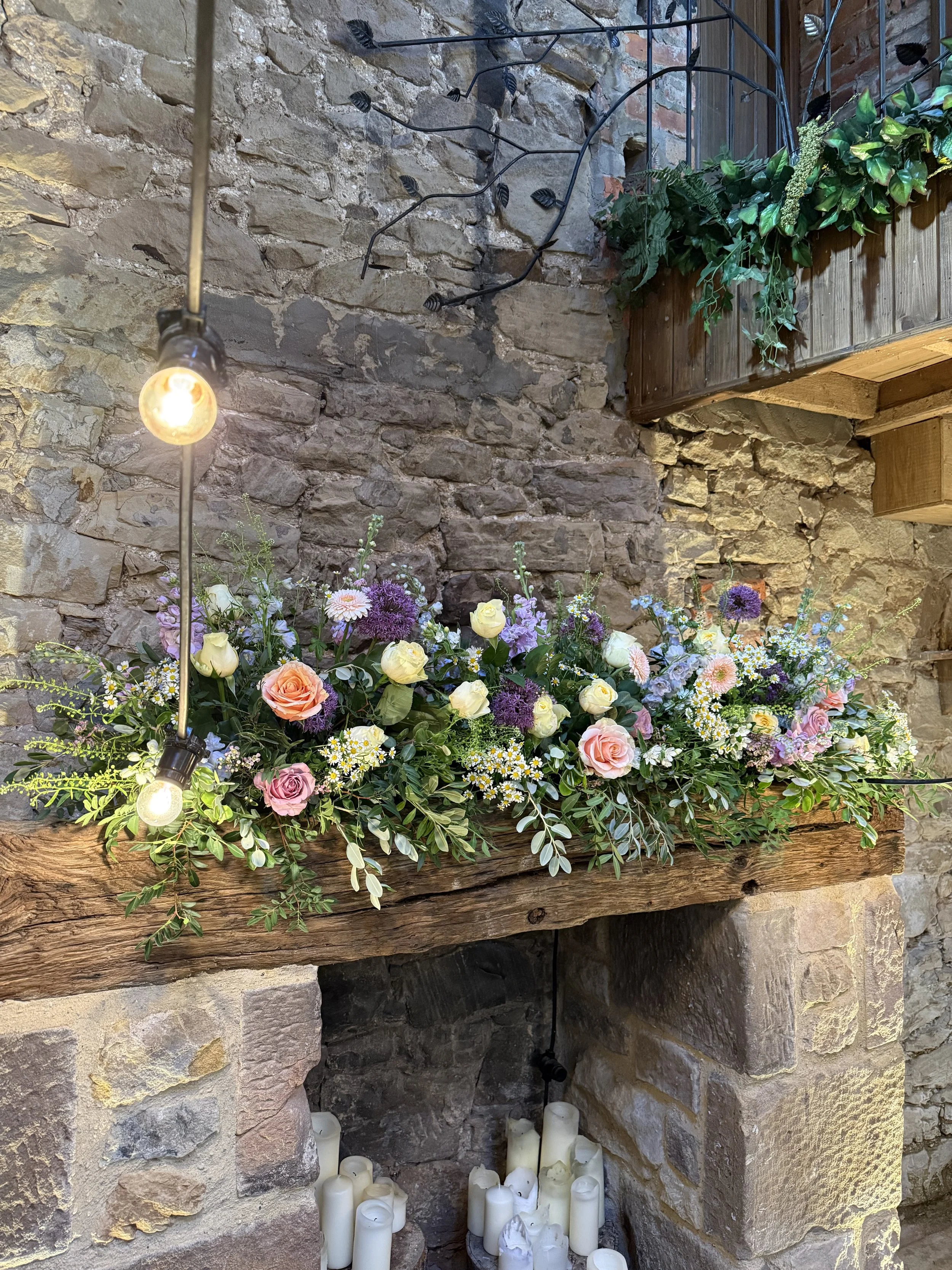 Spring pastel mantlepiece flowers