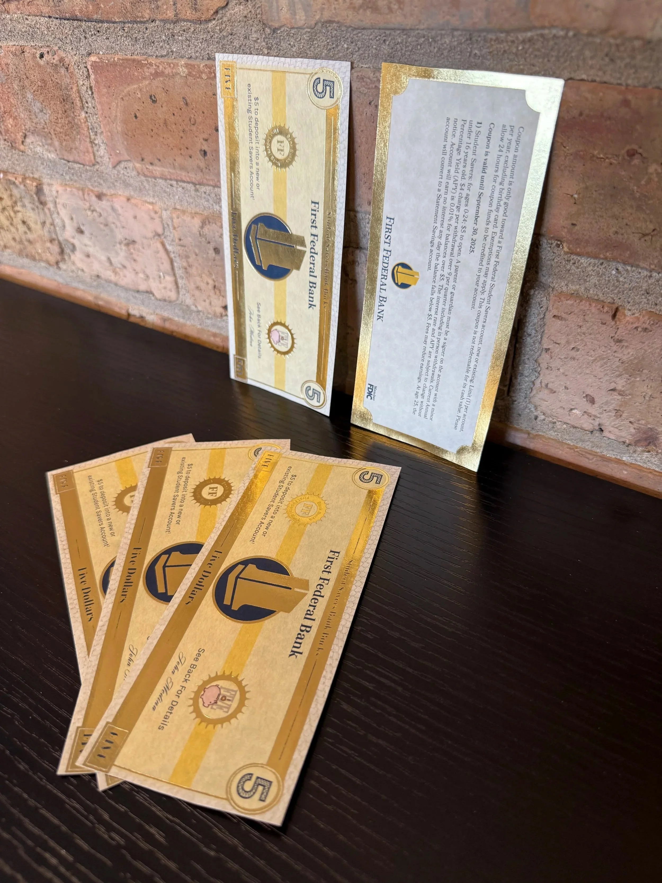 Metallic foil ink on printed coupons