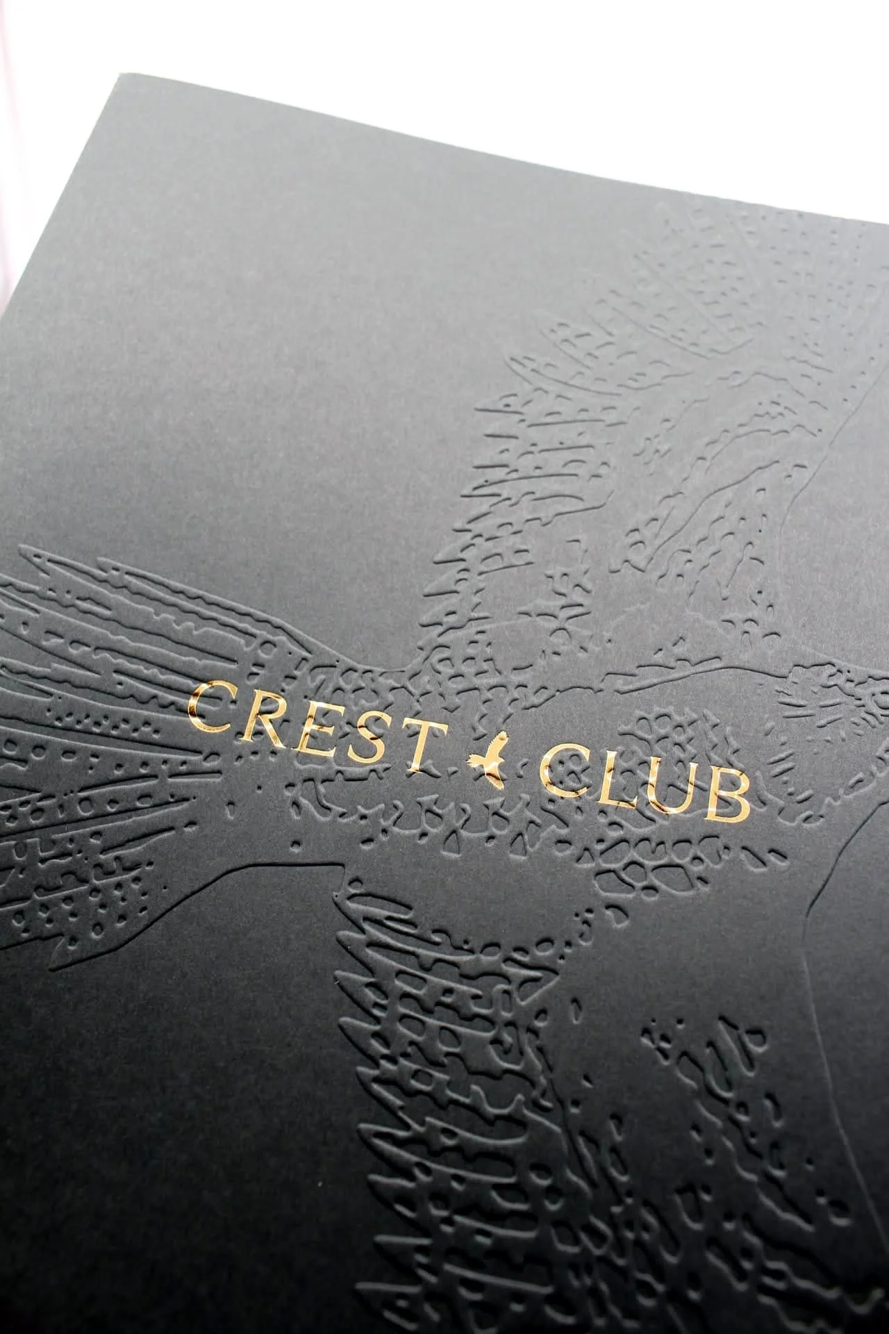 Custom and Unique Folders for the Crest Club with Embossed and Metallic Foil Finishes