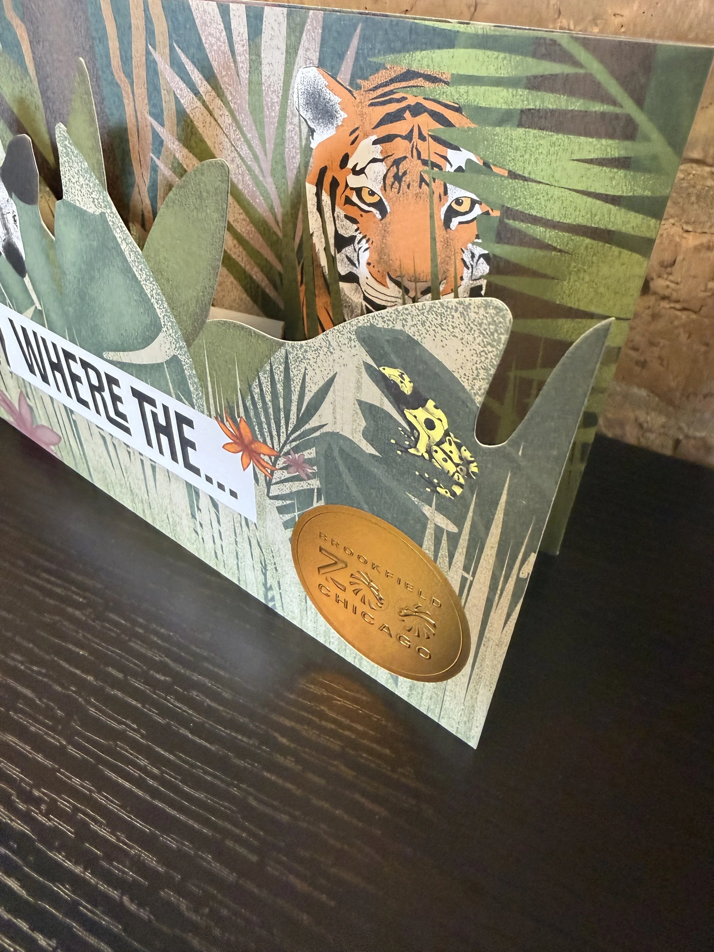 Award Winning Die-cut brochure with a metallic foil stamp in gold