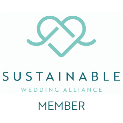 Logo for Sustainable Wedding Alliance featuring a stylized heart made of interconnected lines, with text indicating membership.