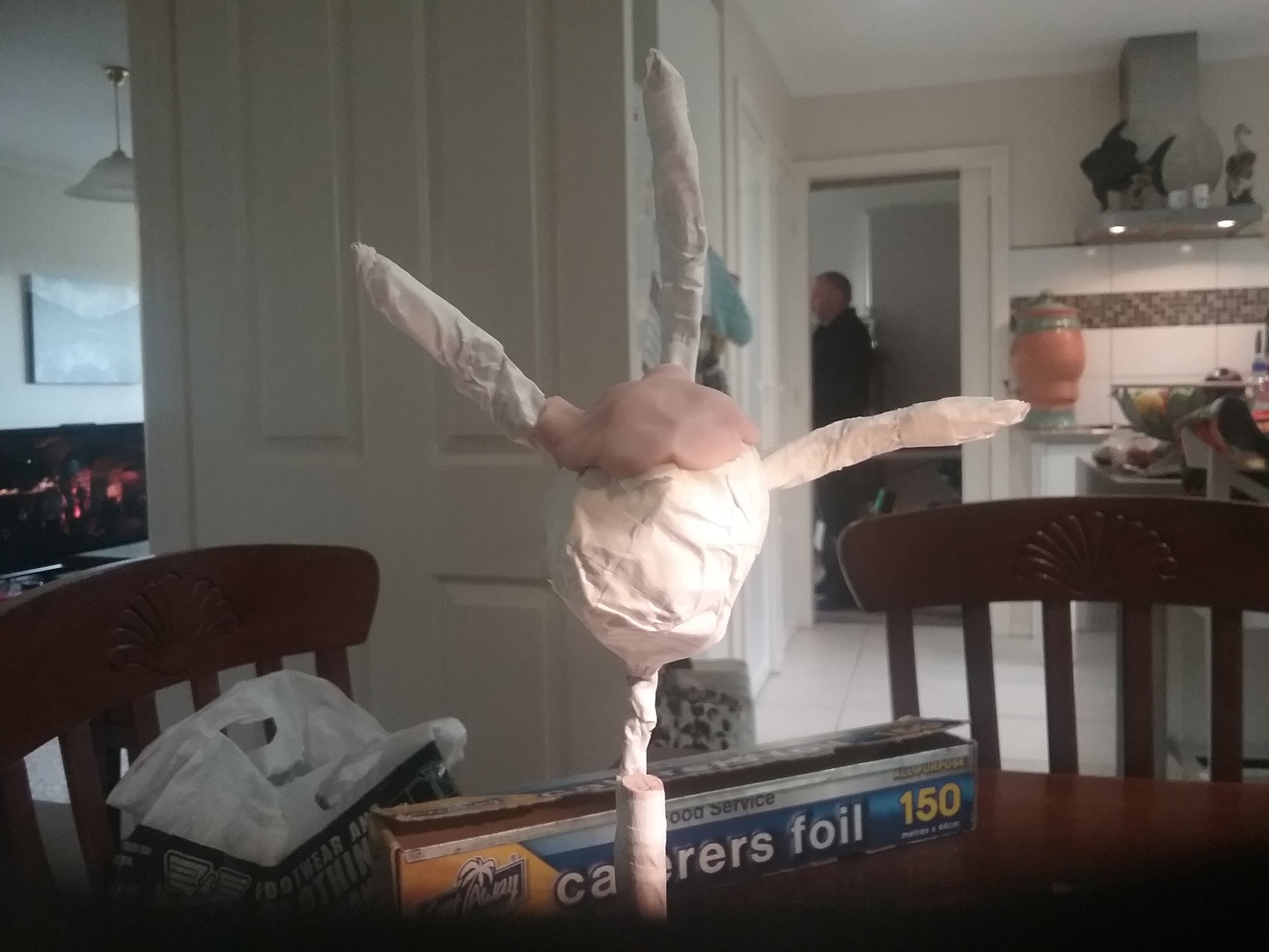 Having never made a troll, designing the shape of the head and what appendages it should have, came down to creating a sense of balance. So three horns appeared and were wired and taped into place for stability. At this stage, it has no name and is