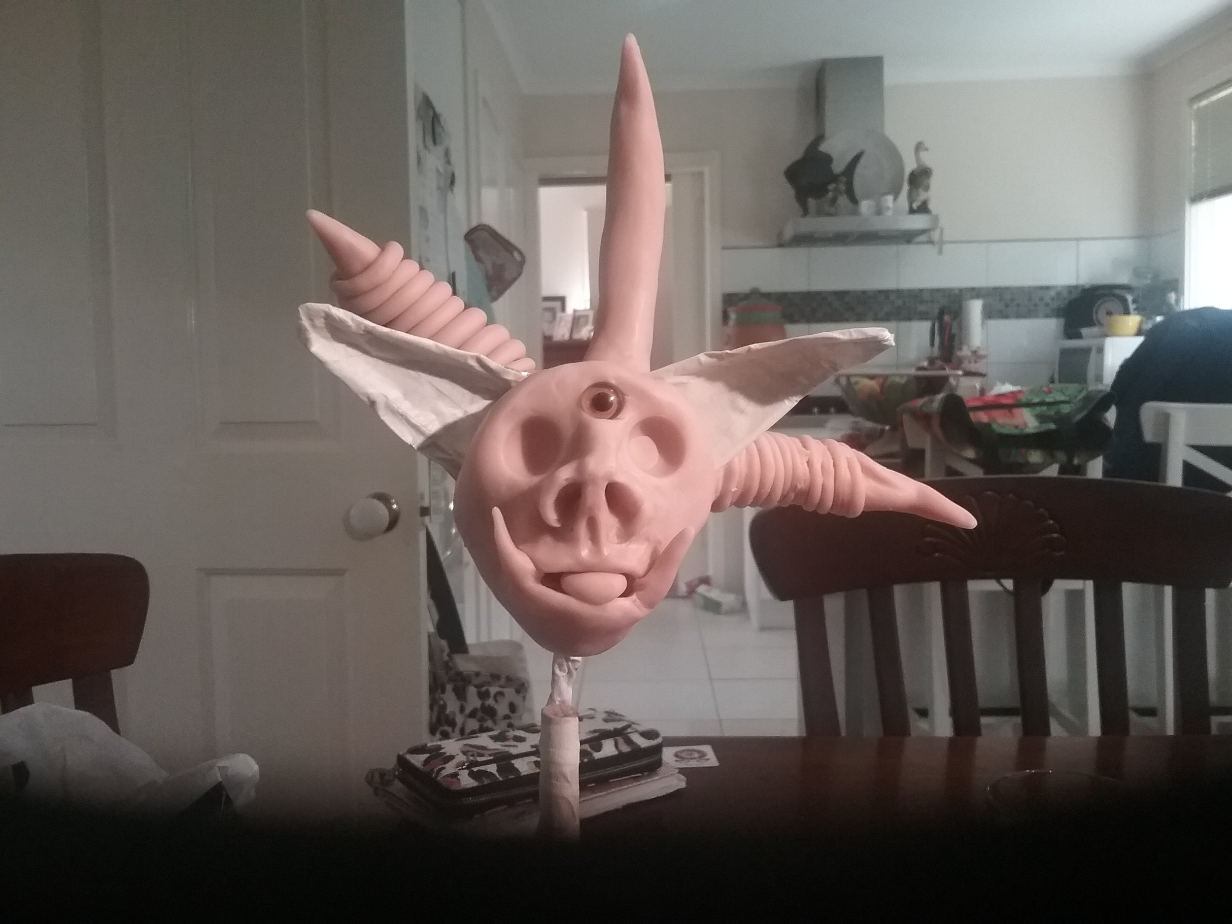 With the edition of two ears and three eyes, the face is taking shape and is beginning to bear the image I have in mind for a troll. One of strength, wisdom and individuality. One serious troll, not to be trifled with.