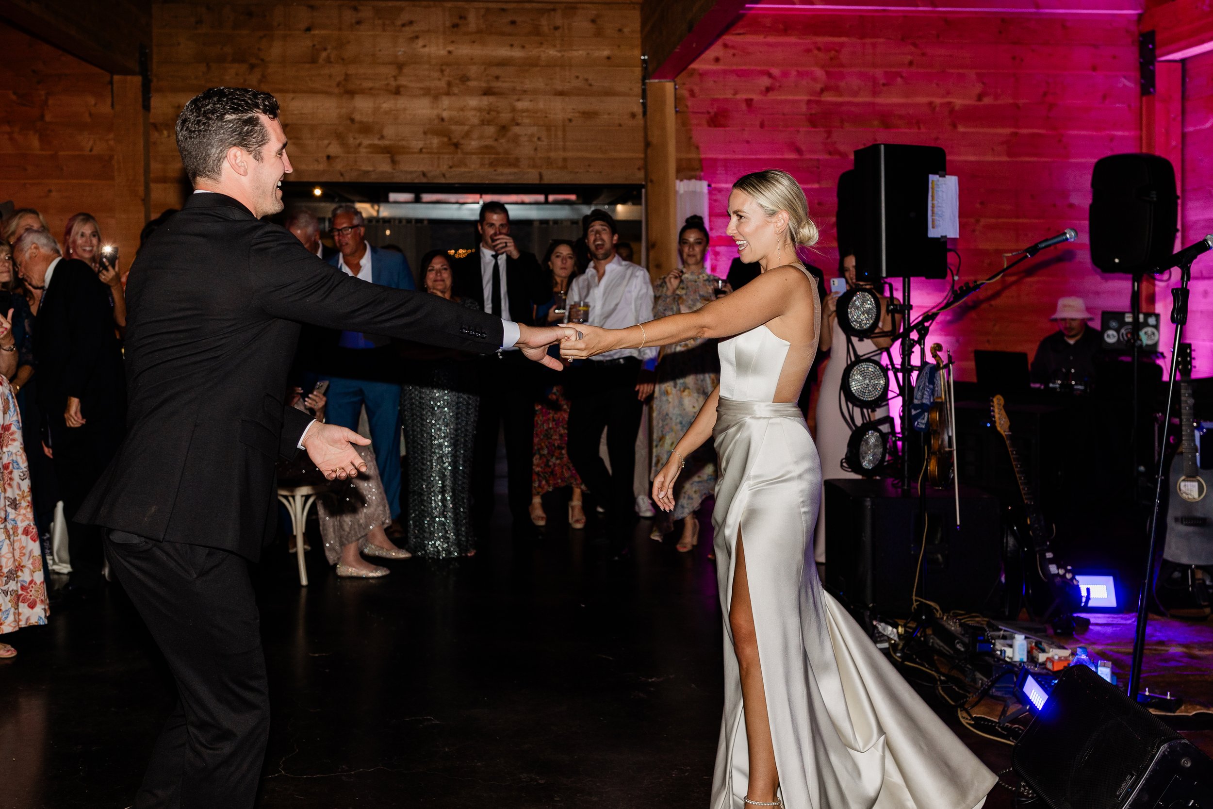 Historic Barn with two-story rock fireplace set for a wedding ceremony