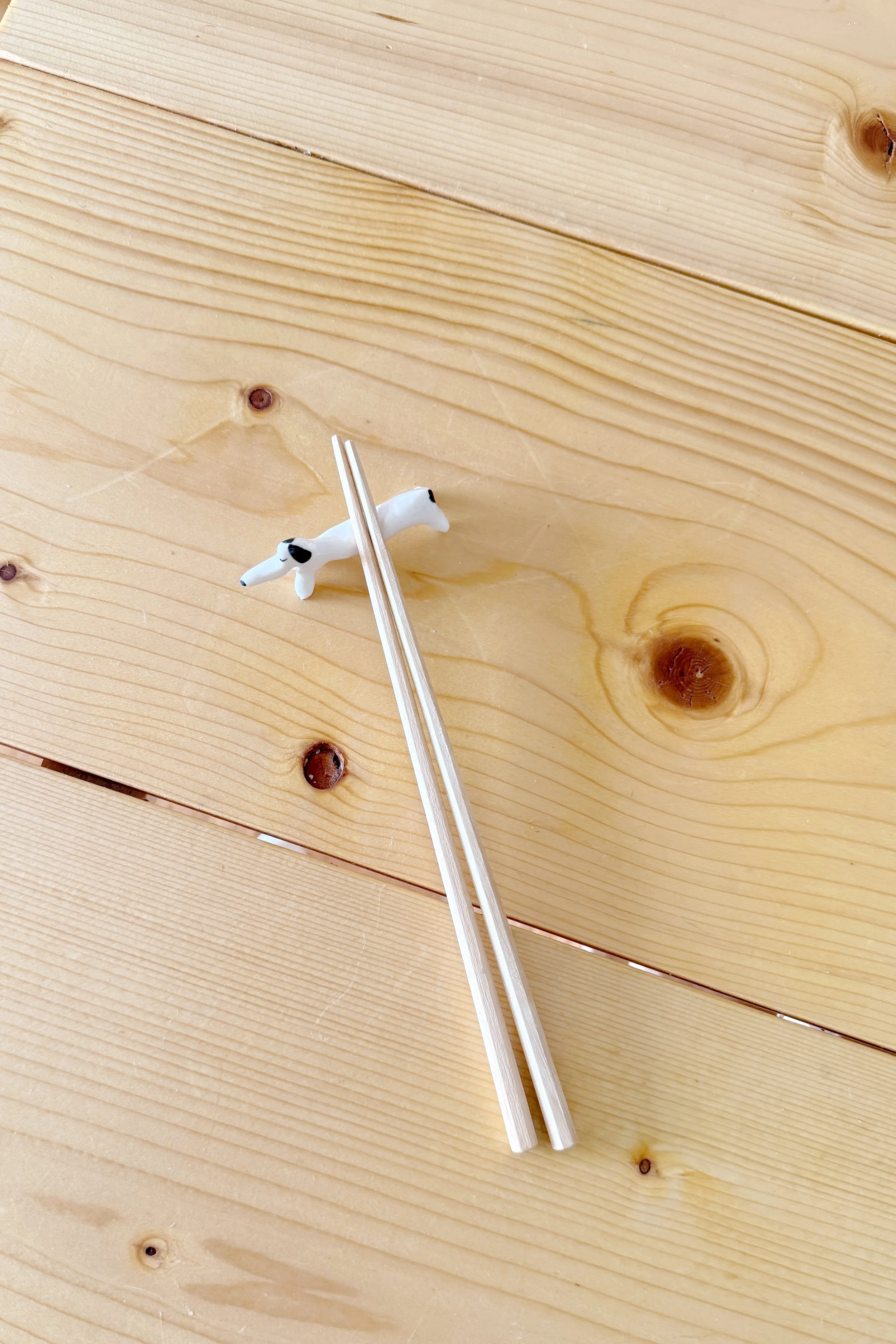 Sleepy Chopstick Dog Rest