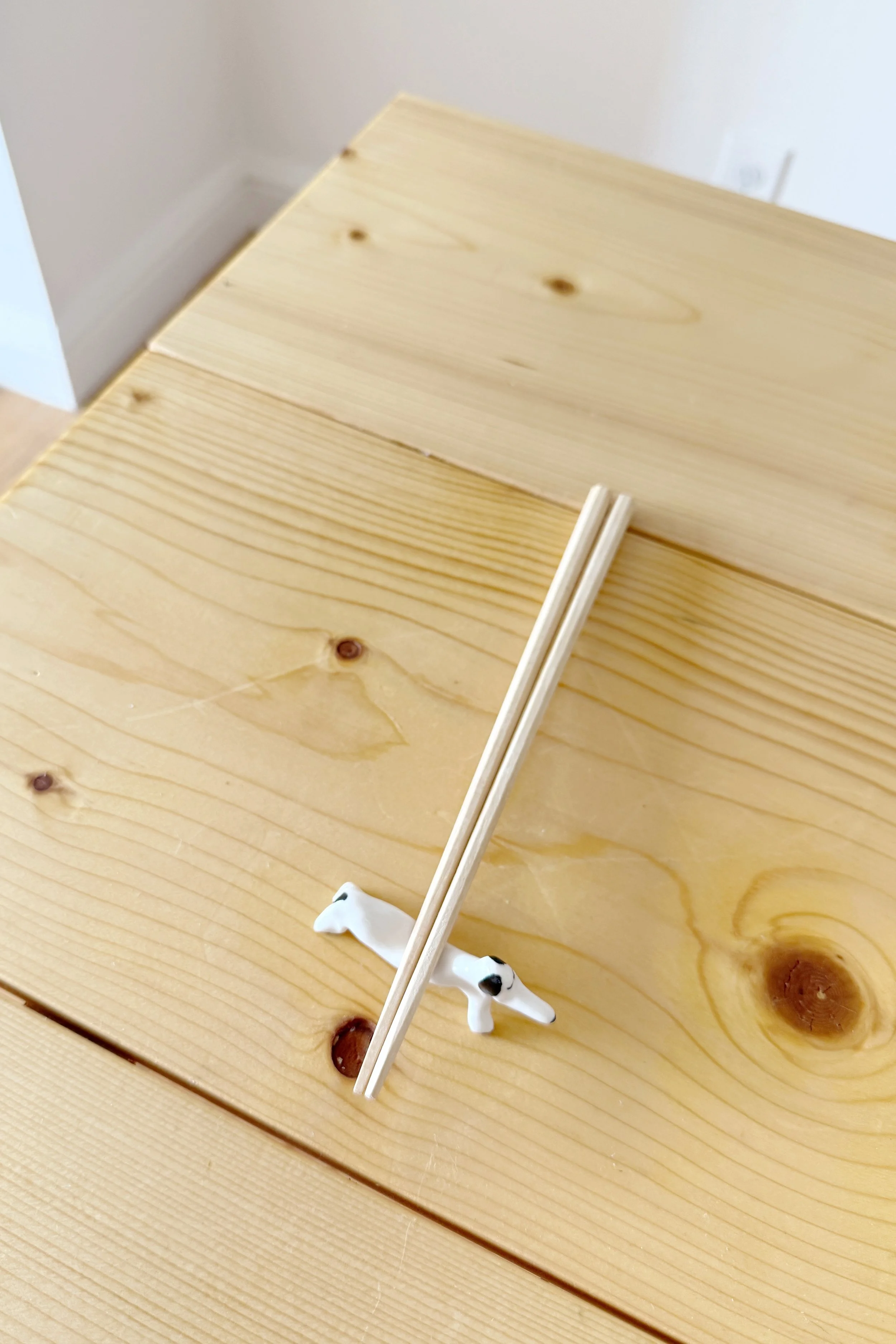 Sleepy Chopstick Dog Rest
