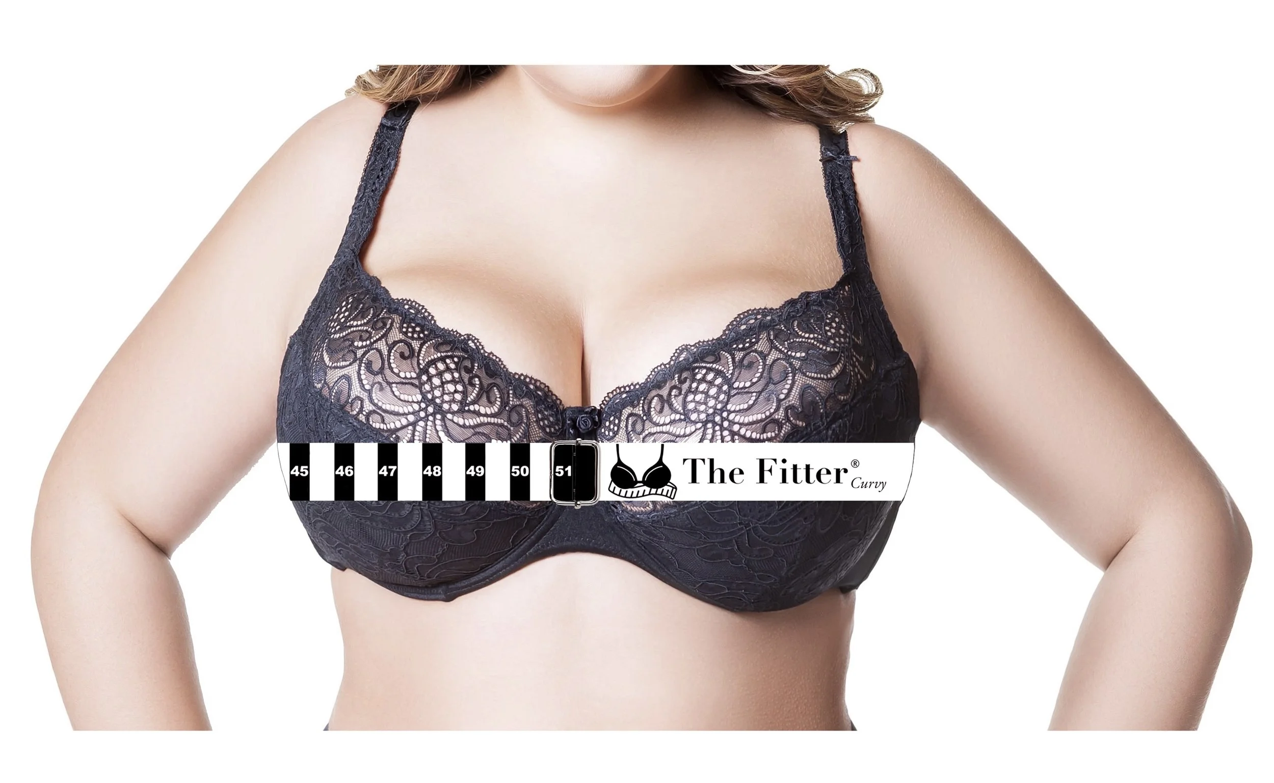 A woman wearing a black lace bra with a measuring tape around her chest, displaying size 45. The measuring tape has markings from 45 to 51 and features the brand name "The Fitter Curvy" with a bra logo.