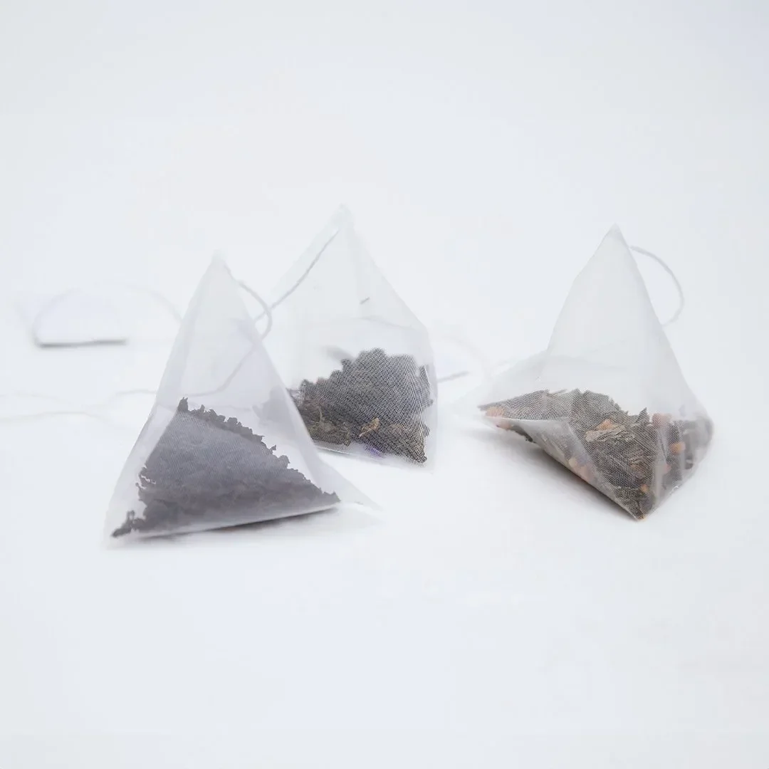 Tea espresso pyramid bags for high-pressure extraction and automated brewing systems