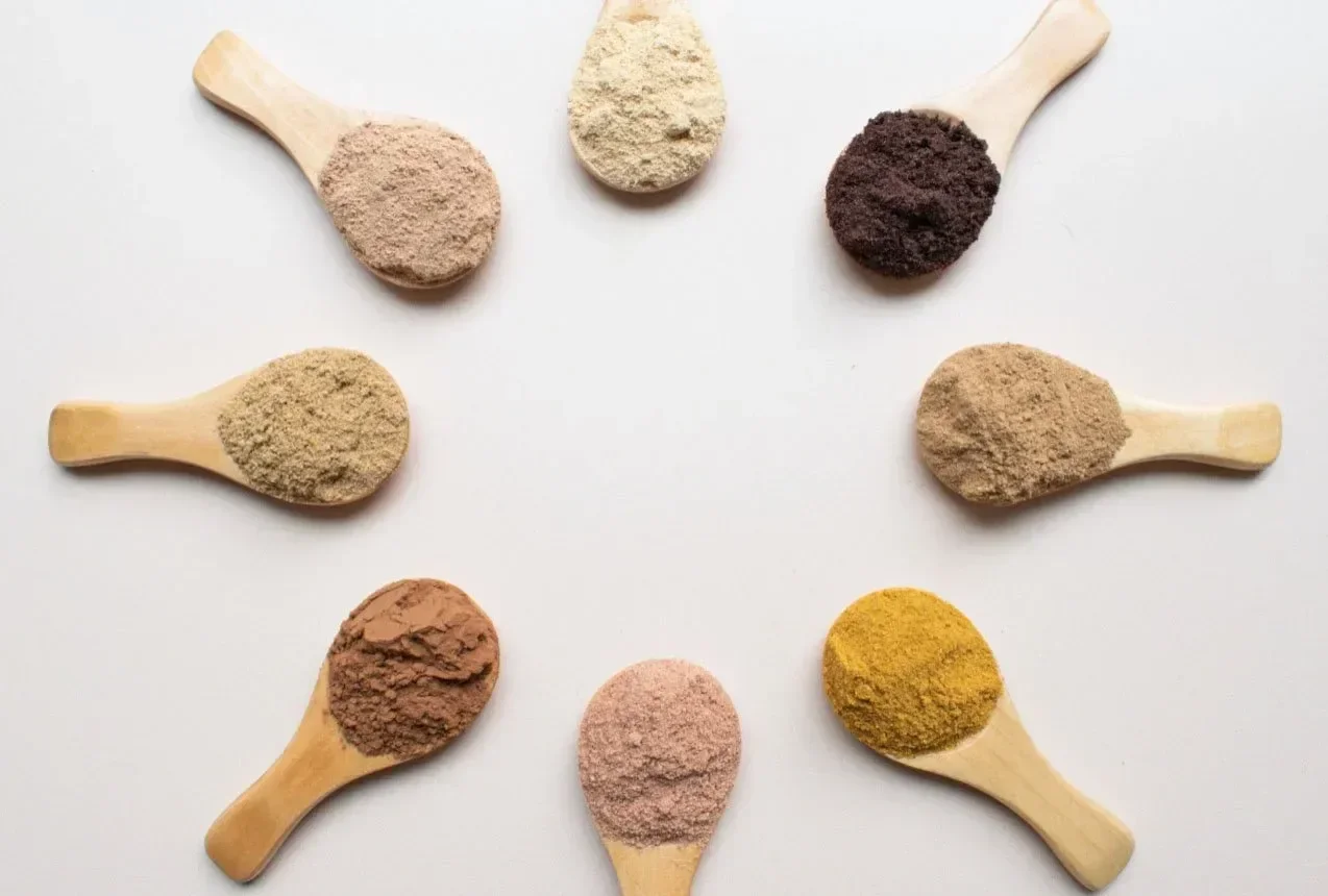Selection of milk tea flavor powders and colored powders used for drink customization