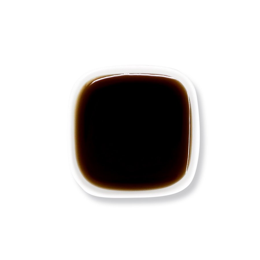Top view of brown sugar syrup showing glossy dark caramel texture.