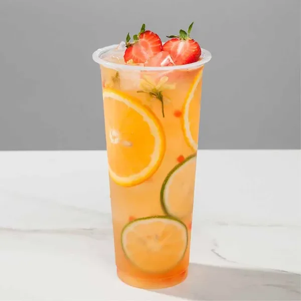 Hawaiian iced tea with orange and lemon garnish – visually vibrant and refreshing.