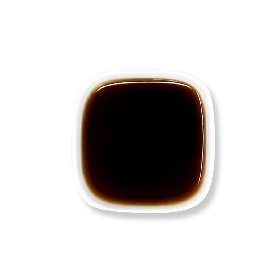 Top view of ginger syrup – deep dark hue with smooth texture.