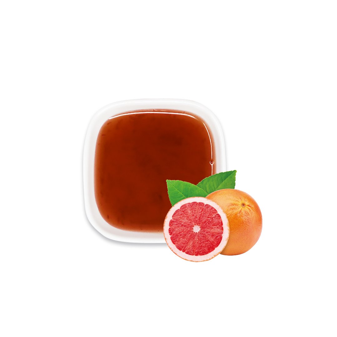 Ruby grapefruit syrup with fresh slices – vibrant and tangy for citrus drinks.