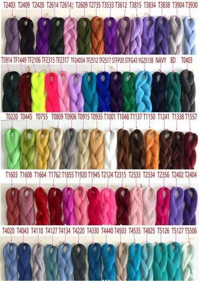 A variety of colorful yarns organized in rows on a display board, each labeled with a unique code.