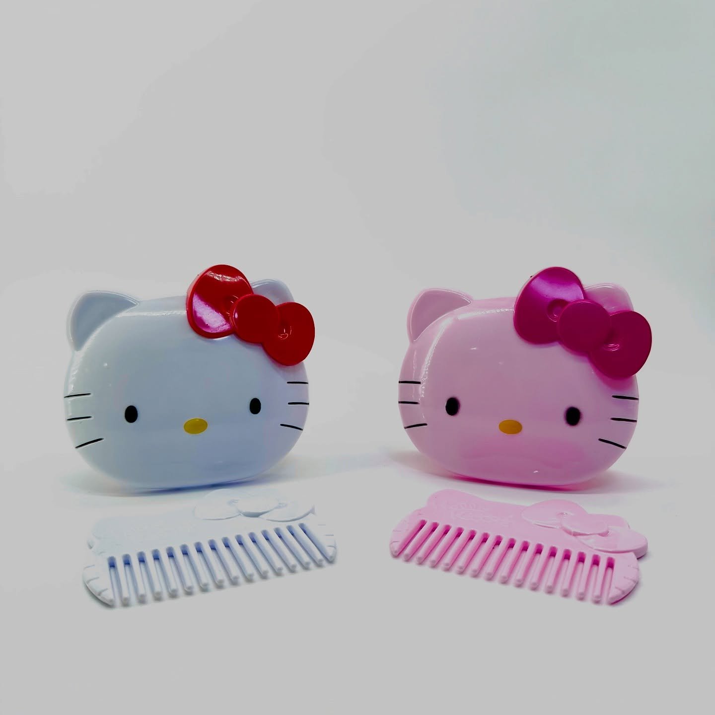 The Sweet Kitty Glam Mirror & Comb is the ultimate blend of charm and functionality. The folding design is sleek and lightweight, making it easy to slip into your purse or pocket. With a smooth comb for styling and a crystal-clear mirror for fla