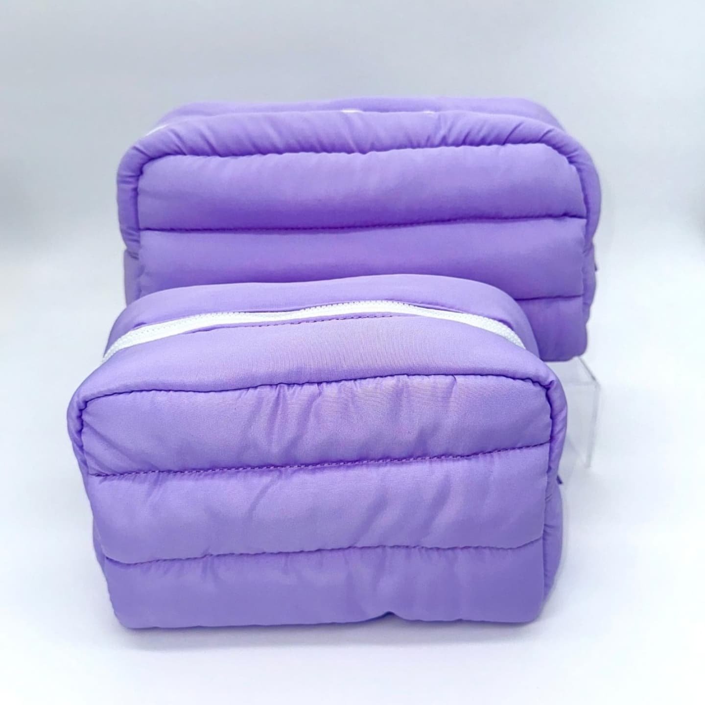 Custom Lavender Soft Padded Nylon Puffer Quilted Zipper Cosmetic And Travel Bags Now Available in (2) Sizes.
#travelessentials #travelkits #cosmetics #mimiandyves #MYtravelkits #makeup #toiletrybag #travelnurse #usa