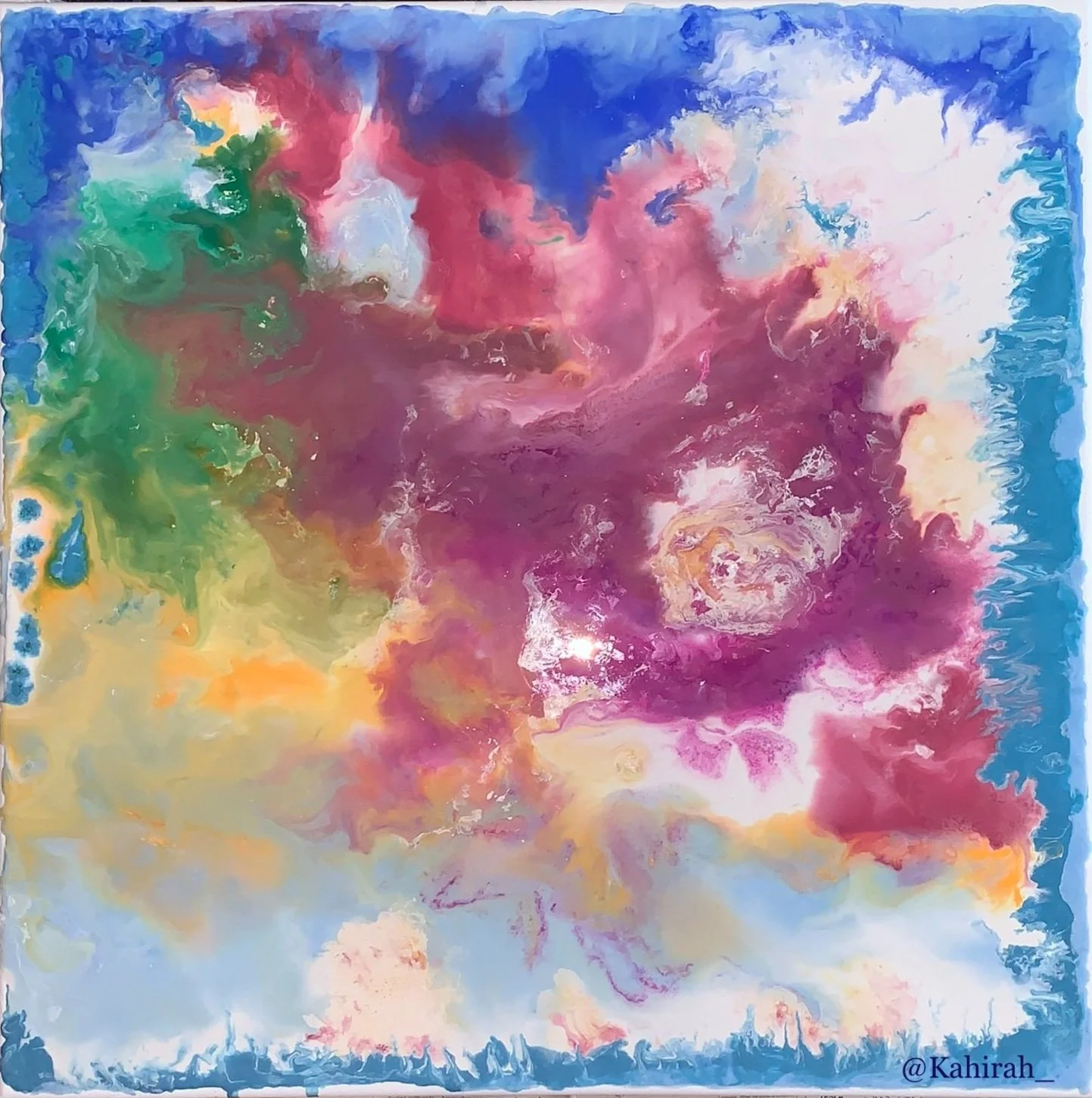 Abstract watercolor painting with vibrant swirls of pink, purple, blue, green, yellow, and white, resembling cosmic clouds or nebulae.