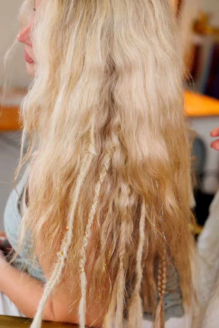 a long blonde hair with extension dreadlocks