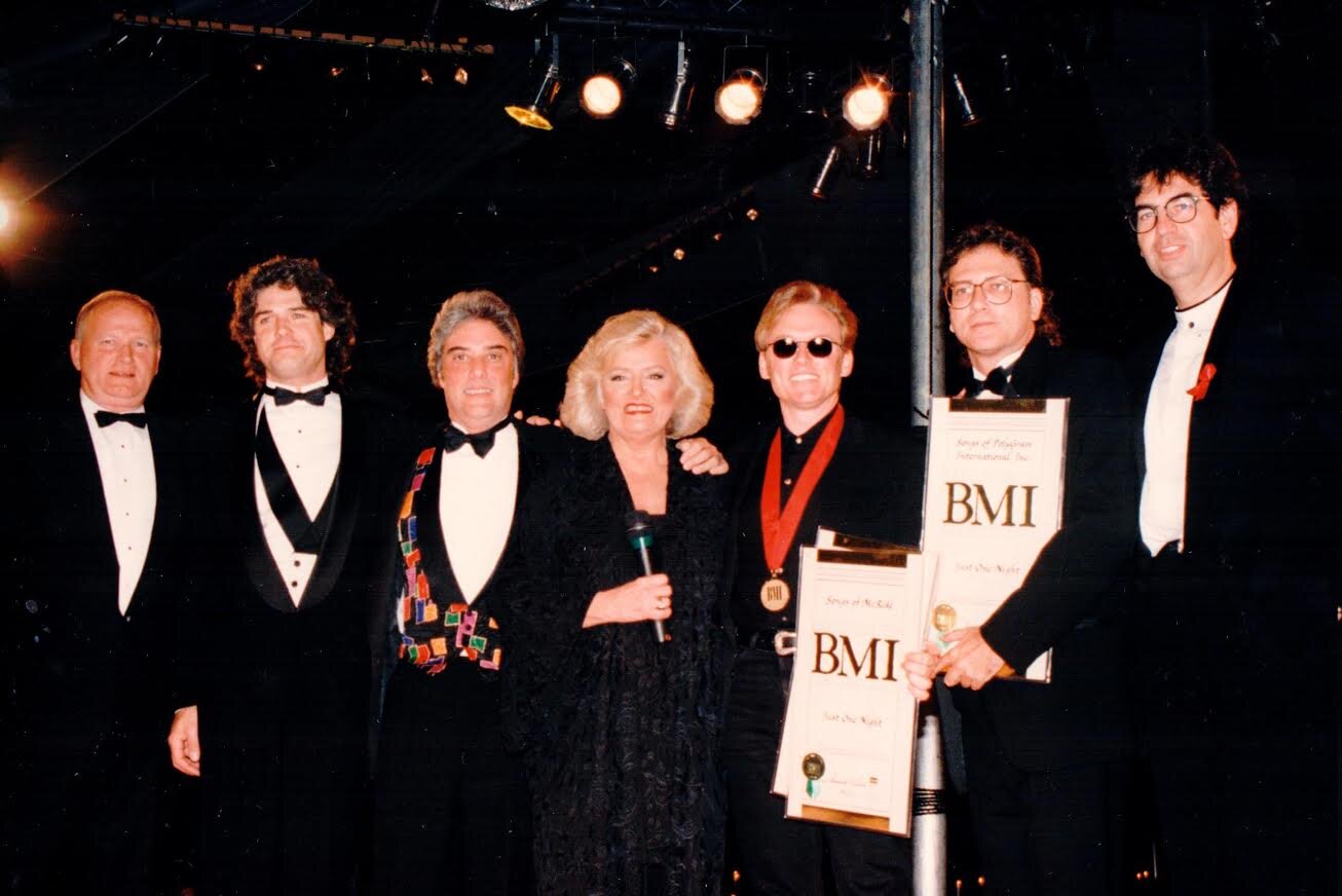 Terry accepts an award from BMI President, the late Frances Preston, and his publishers at the time