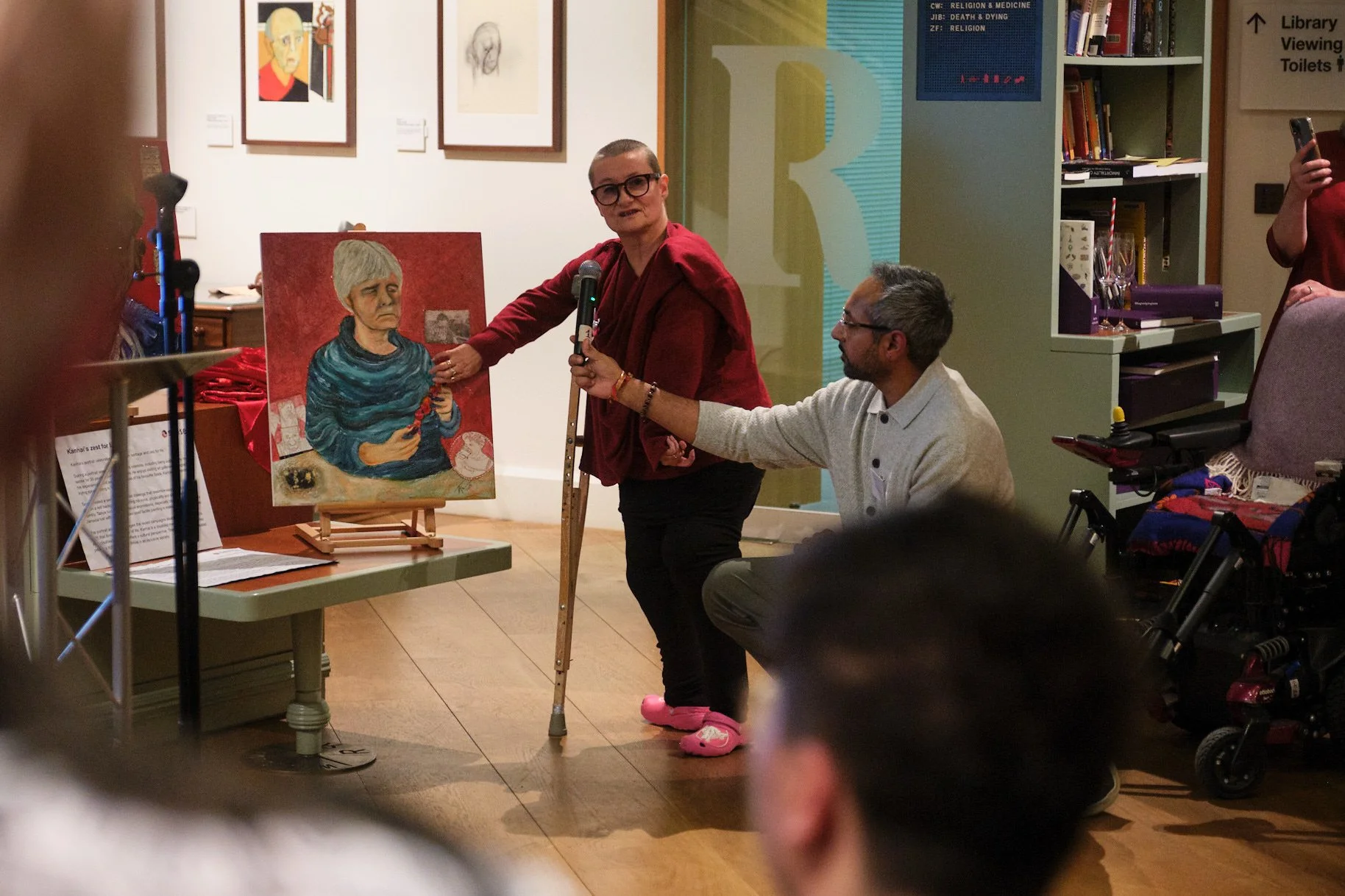 The artist Tanya Raabe-Webber presents her portrait of Bunty celebrating the 70th Anniversary of the charity sense at the Wellcome Trust.