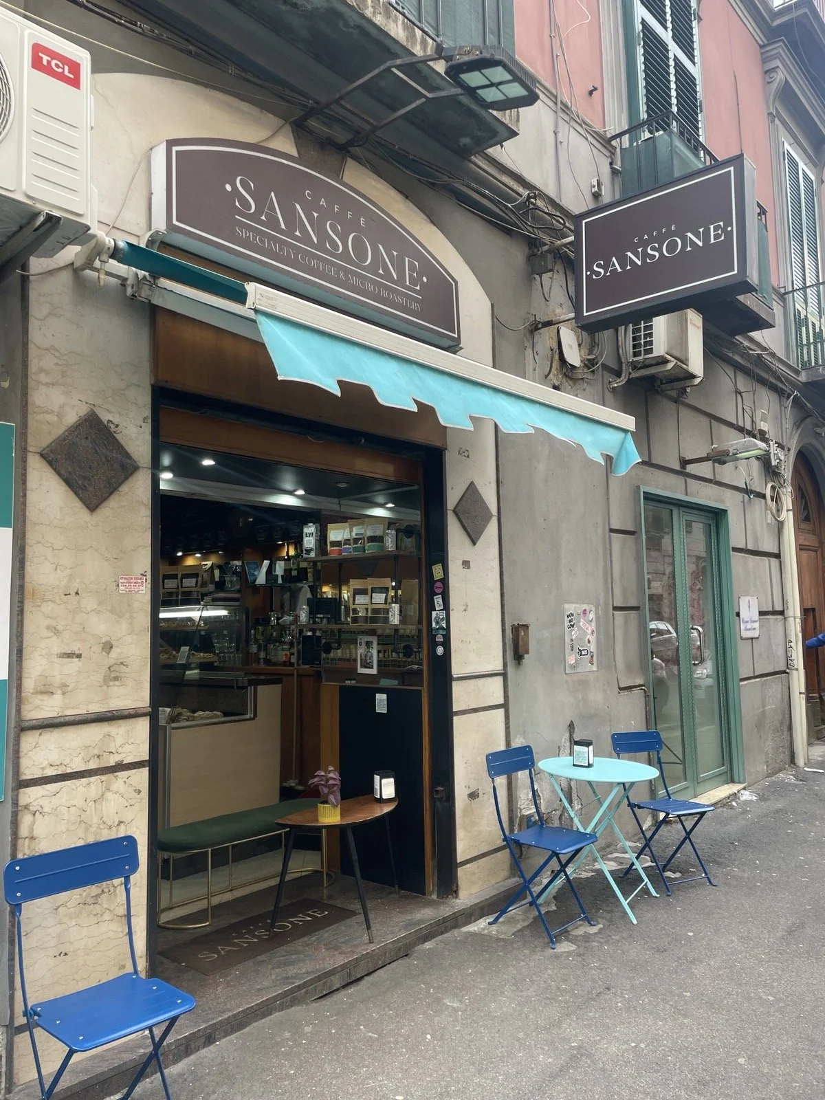 Italian coffee shop exterior with marble walls.