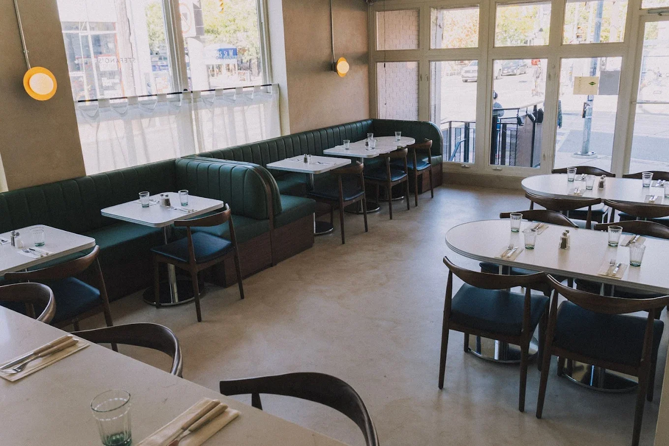 Stylish diner interior with turquoise seating.