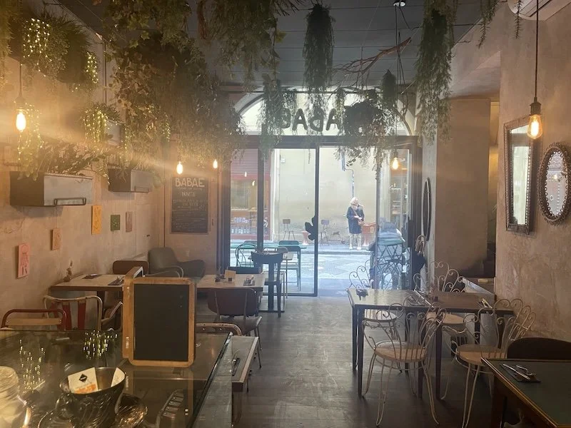 Verdant restaurant interior in Florence, Italy.