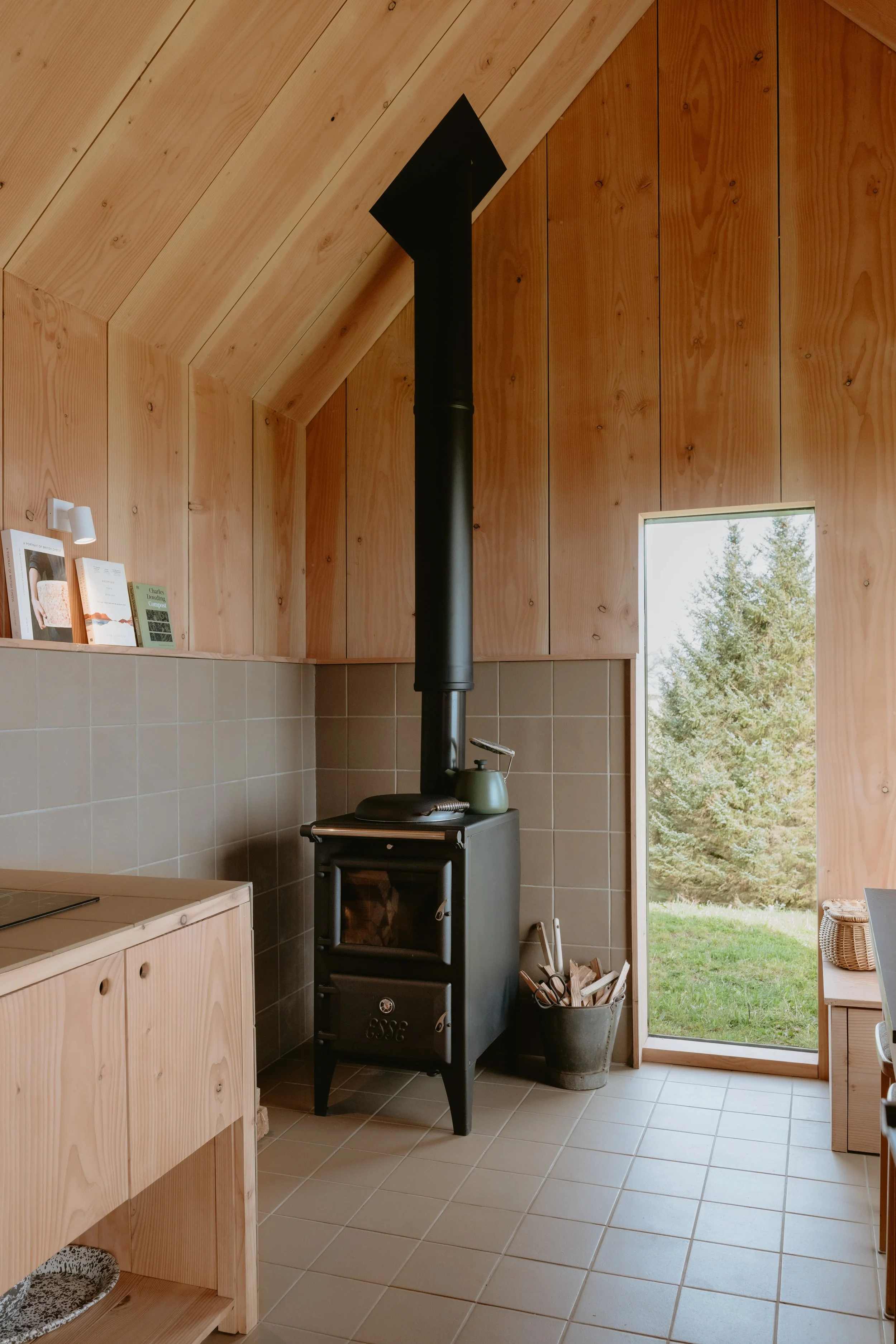 An Esse Bakeheart stove, perfect for cooking on, watching the flames flicker and for heating the hut on cooler winters evenings. 