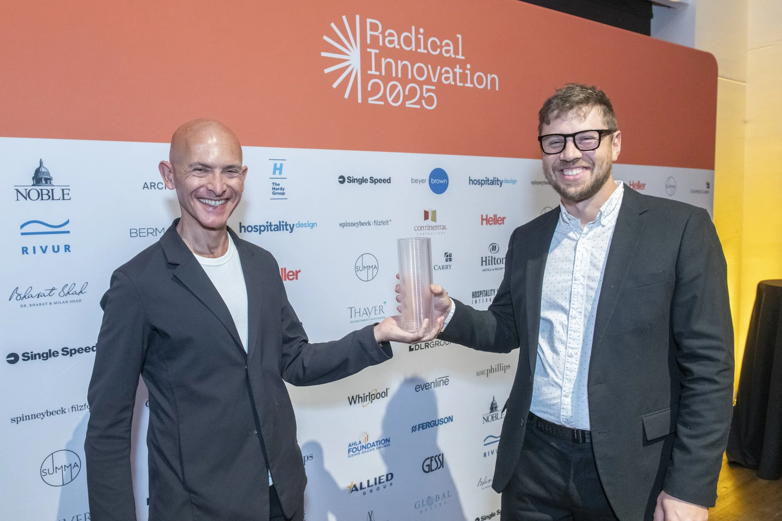 Josh and Michael with Award.jpg