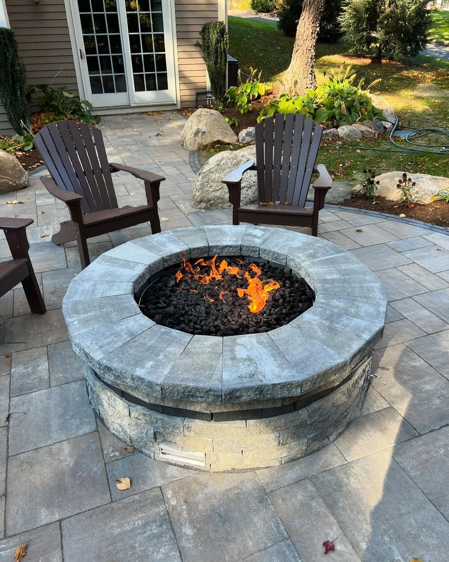This customer wanted to enjoy this new patio without the mess of a wood fire. We got them hooked up with a natural gas fire pit insert. Now they can enjoy with a turn of a valve!