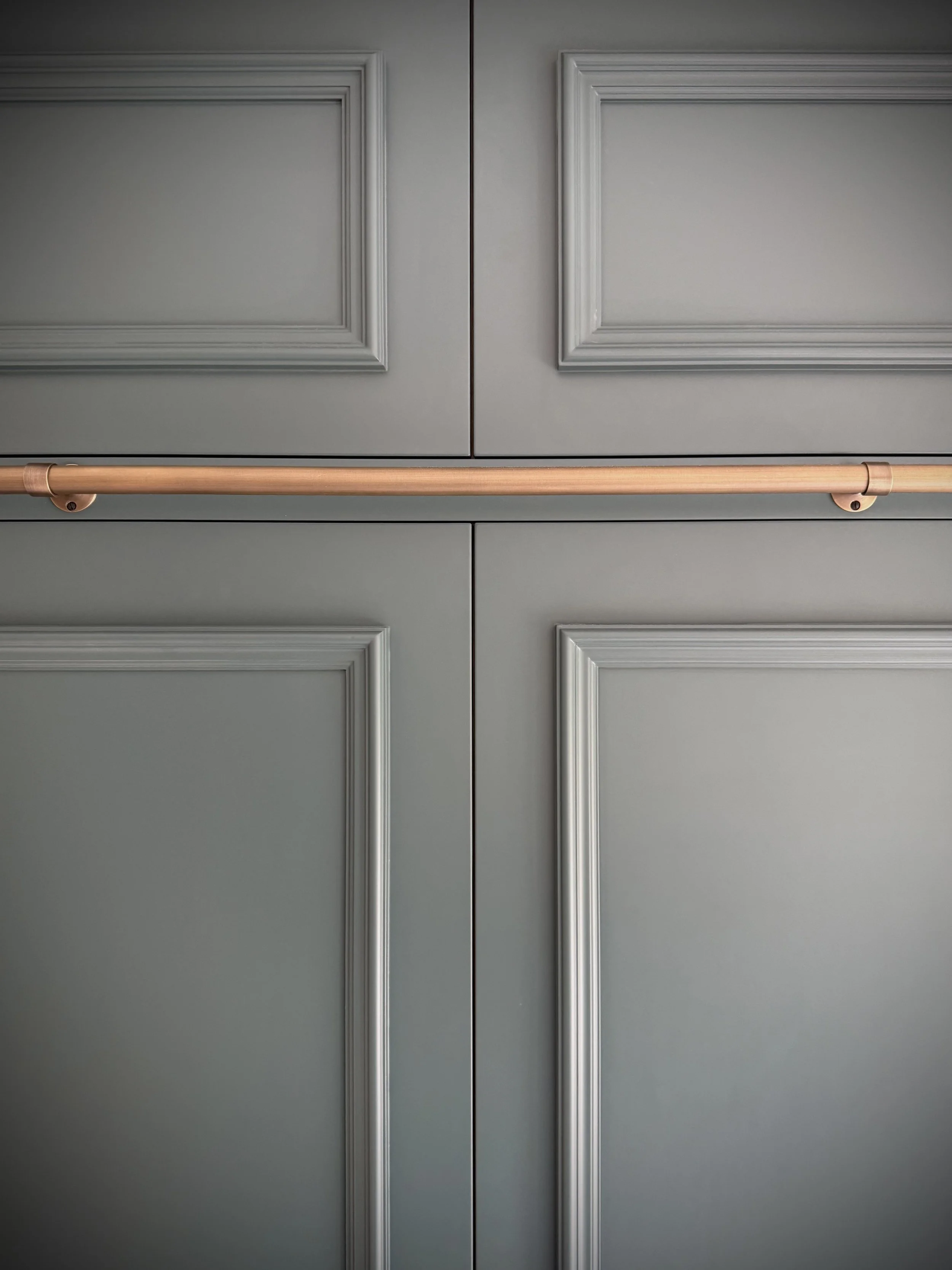 Antique brass rail