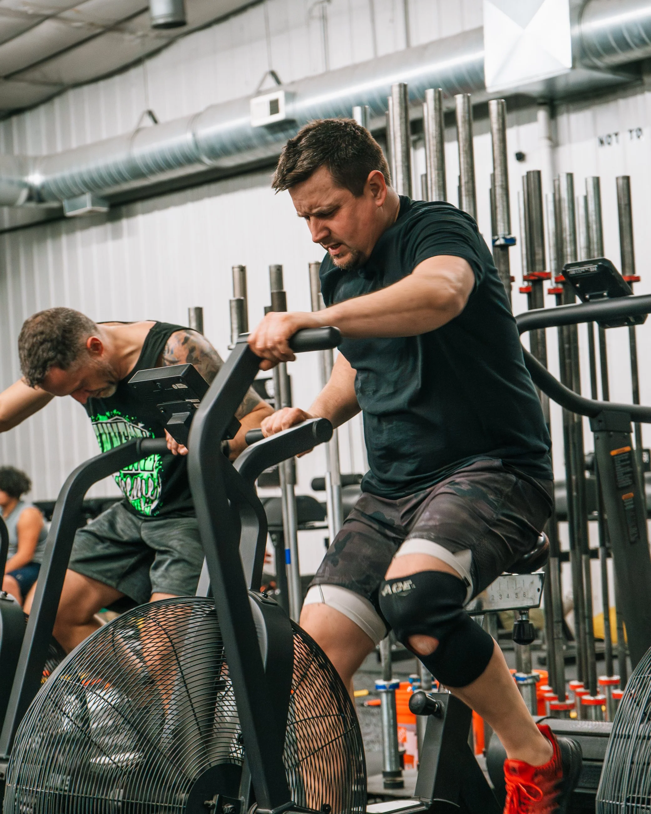 Woman Biking On A CrossFit Echo Bike