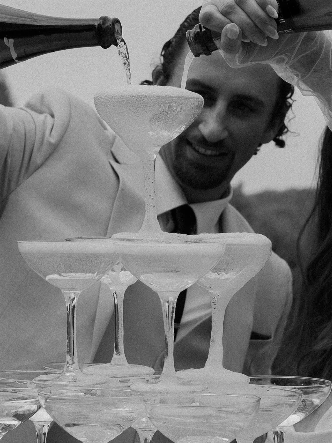 Celebratory, timeless, and unforgettable. They’ve quickly become one of the most sought-after wedding day experiences.
At Eido Bar Company, we’re thrilled not just to offer champagne towers, but any drink tower you can think of, as an add