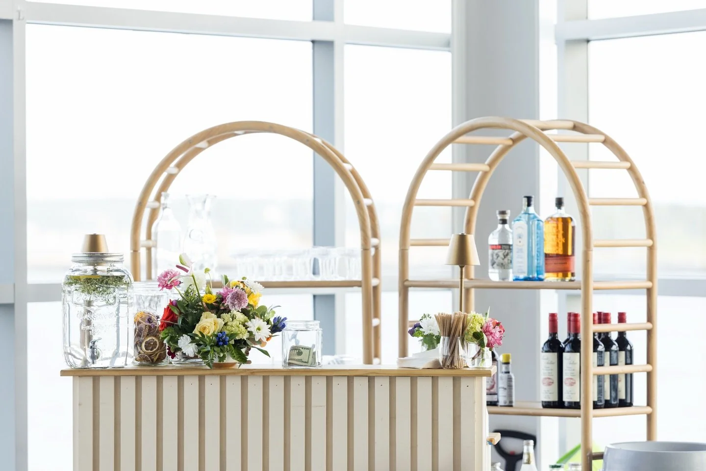 Our bar offerings are thoughtfully matched to complement the atmosphere of your event ranging from signature horse trailer bars and tailored custom builds to refined satellite bars, elevated back bar shelving, and elegantly styled bar carts. Each one