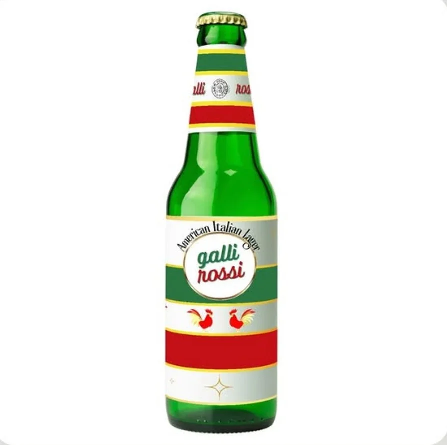 Green glass bottle of Galli Rossa American Italian Lager with a colorful label featuring red, white, green, and yellow stripes, and illustrations of two red roosters.