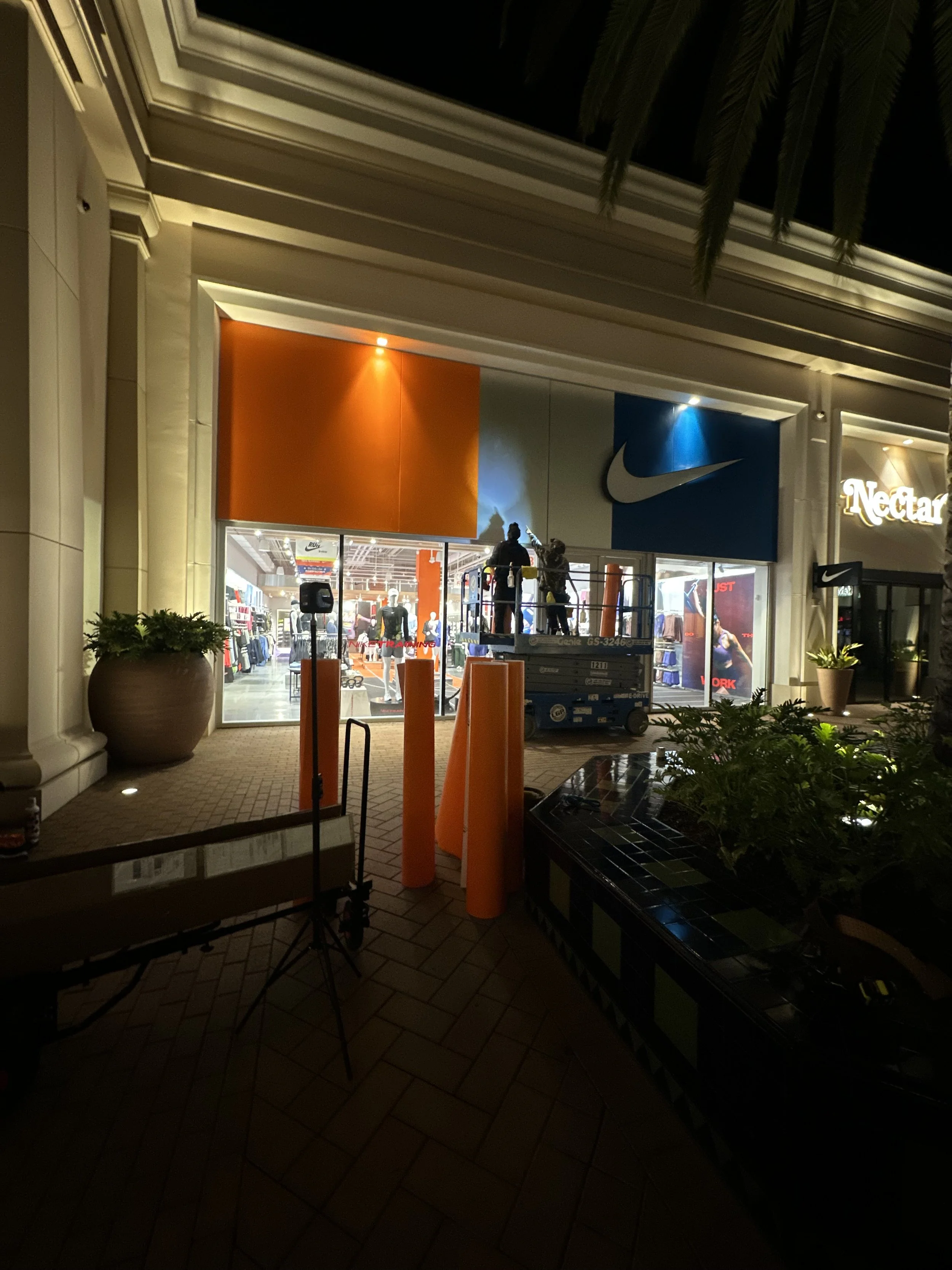 Retail storefront facade color change and large-format graphics installation completed for a Nike location in Irvine California