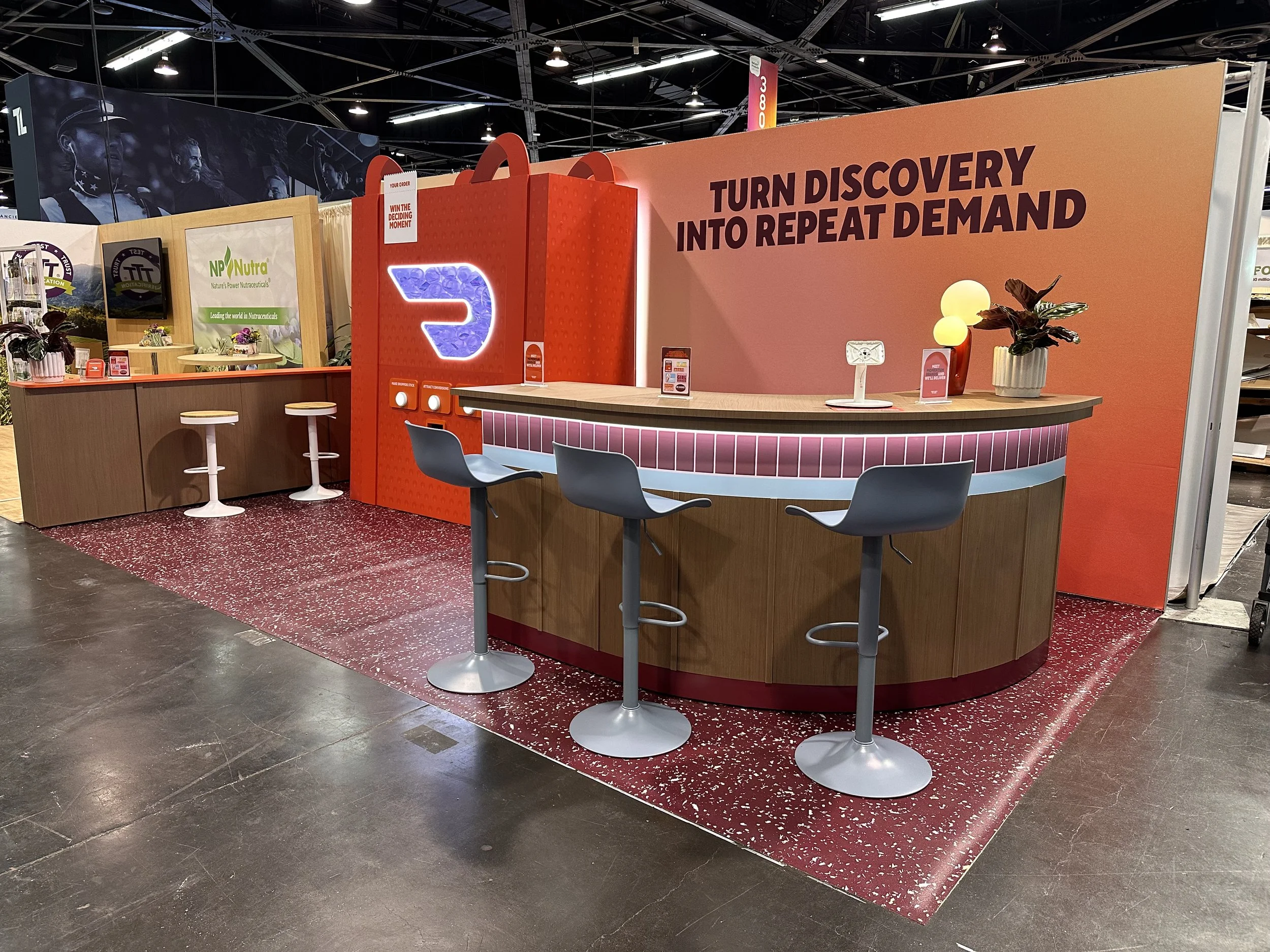 Custom trade show graphics and experiential branding installation completed by Vivid Graphic Solutions in California