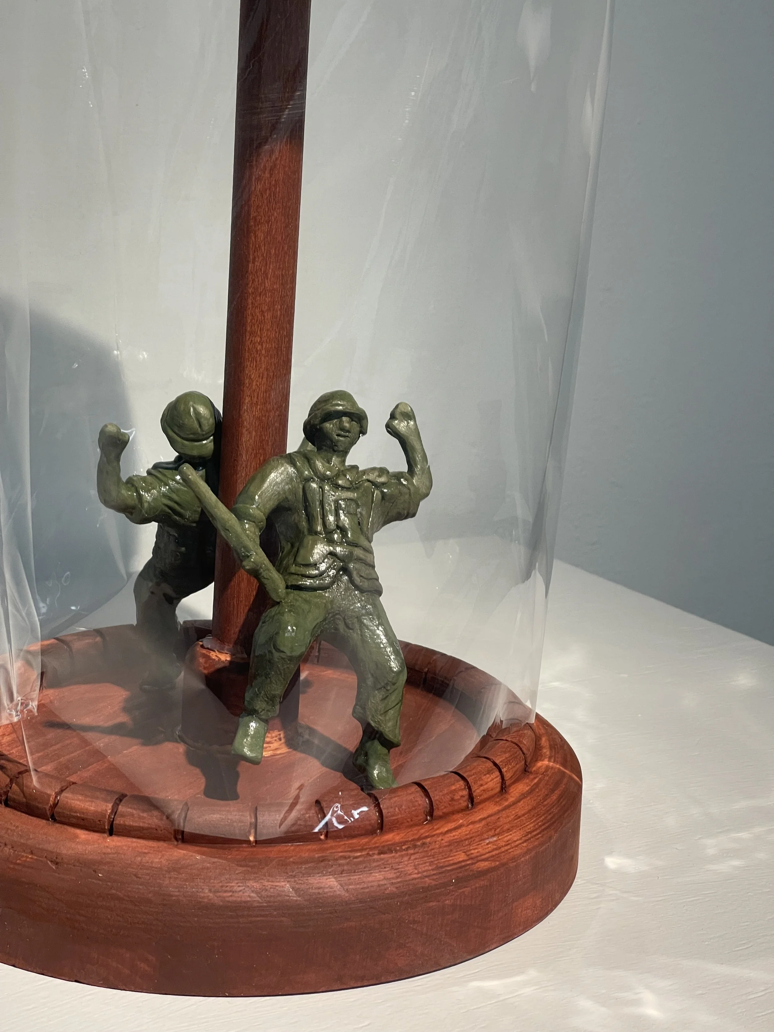 Wood, clay, and cellophane