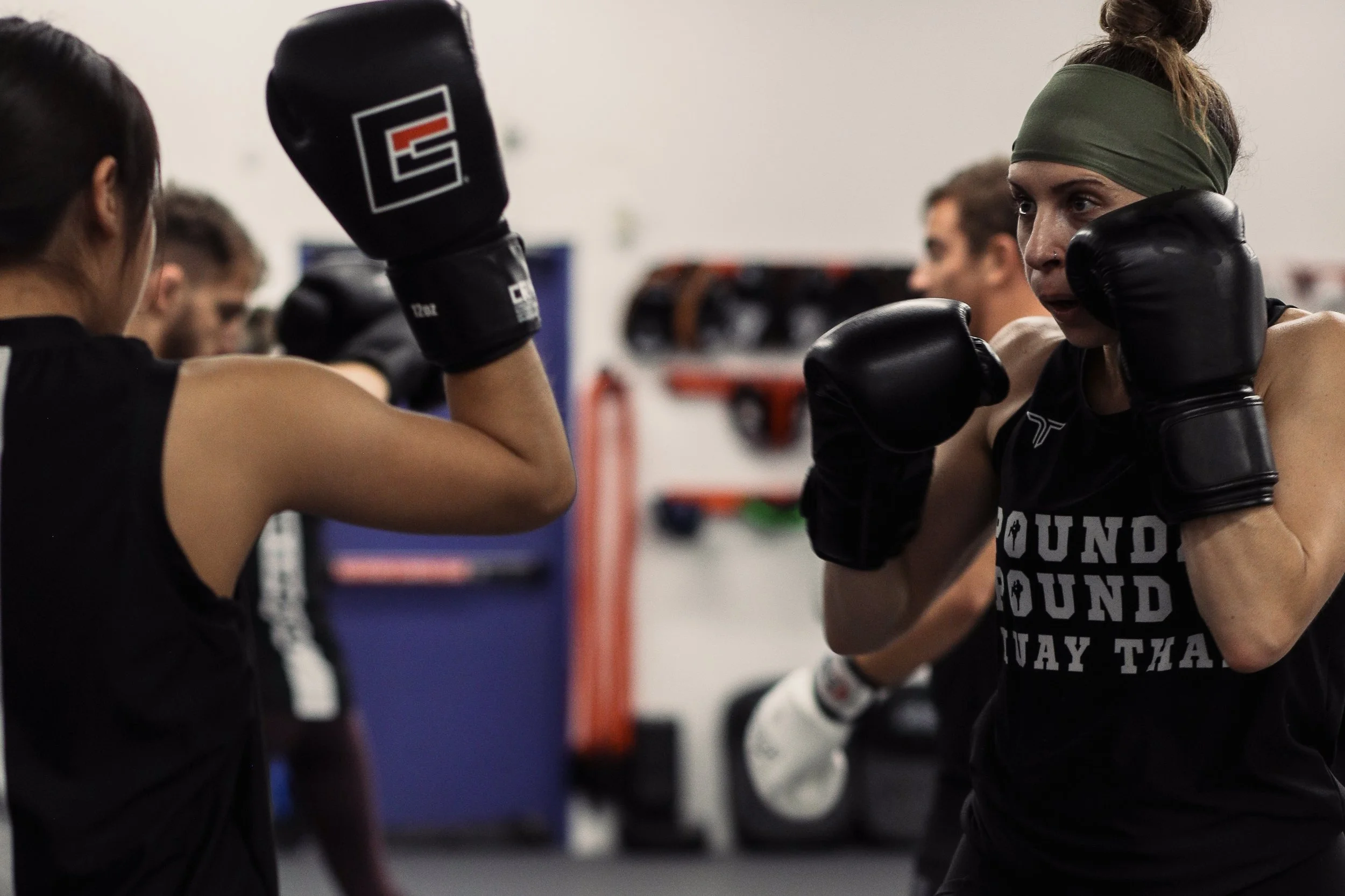 Focused striking drills during Muay Thai and kickboxing training at Pound 4 Pound