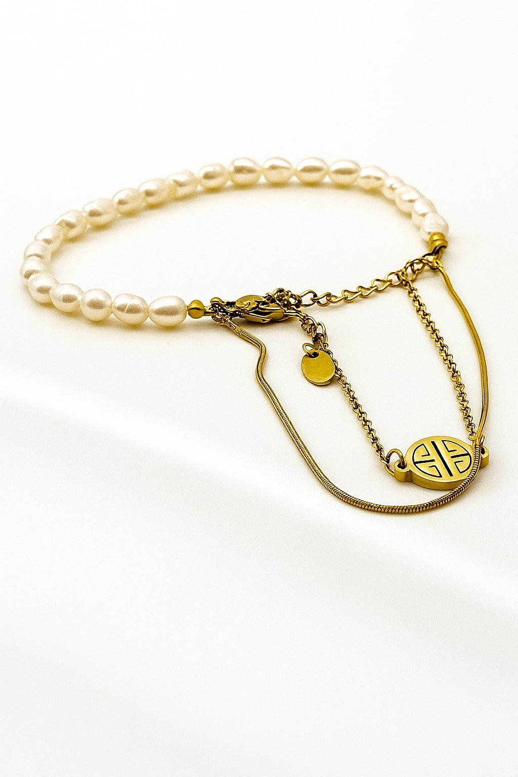 Pearl and Gold Emblem Bracelet