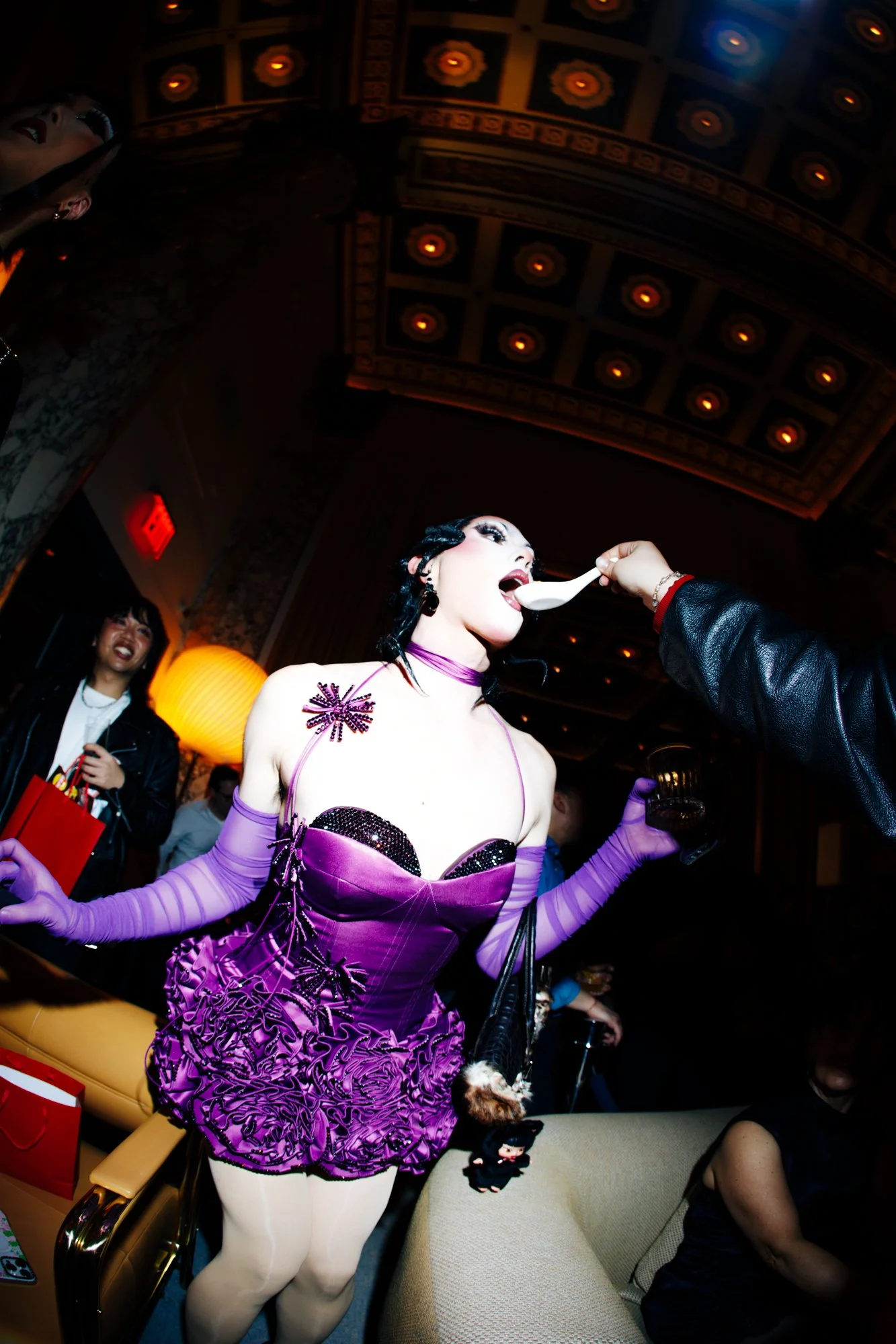 Felicia Oh sampling dumpling by Cha Cha Tang