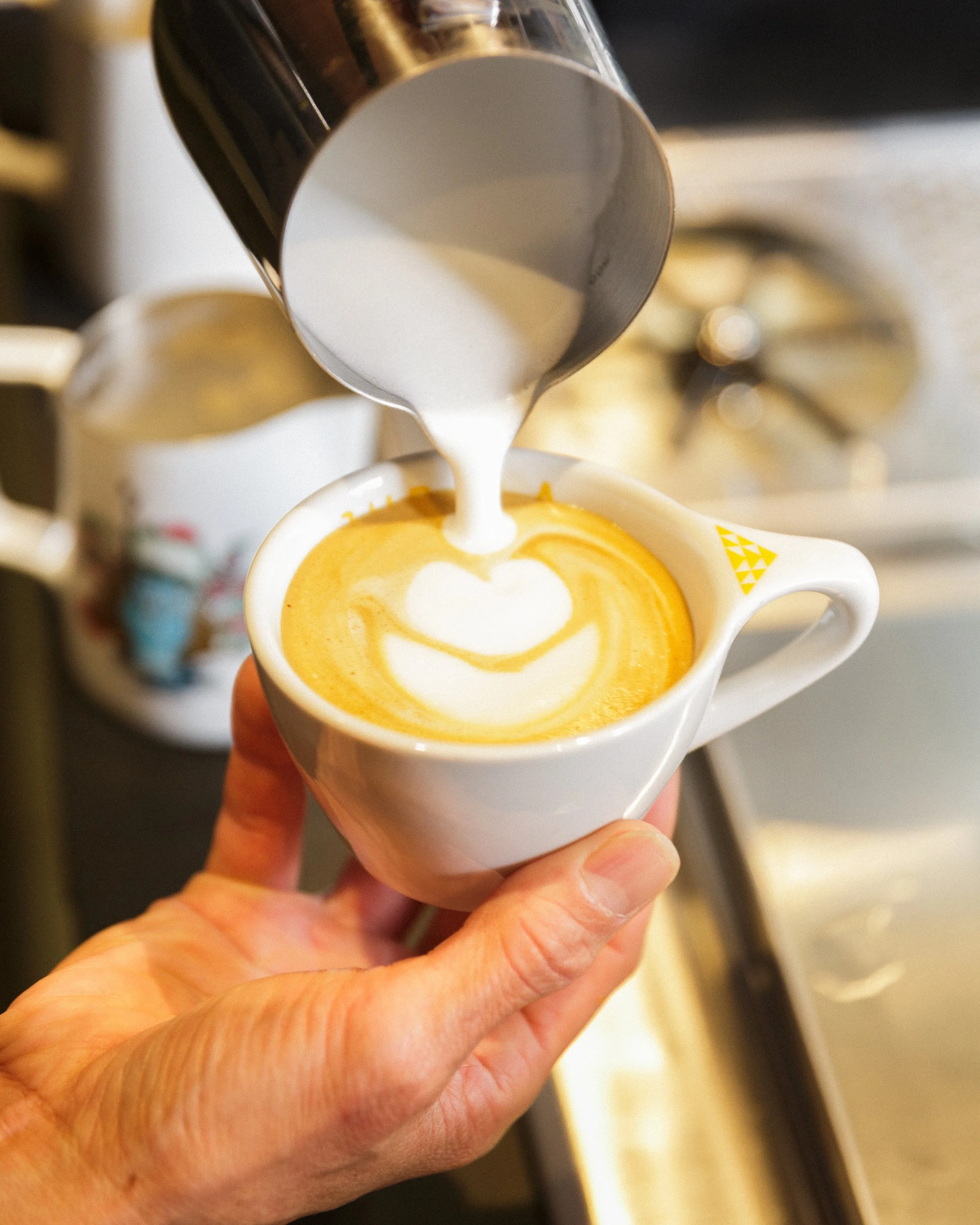 jubala-coffee-shop-barista-pouring-coffee-lifestyle-photography-raleigh-nc-jason-hampden.jpg.jpg