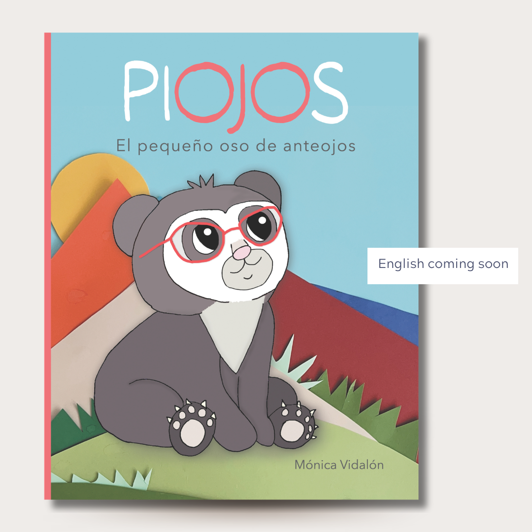 Book cover of Piojos, el pequeño oso de anteojos featuring a little spectacled bear with red glasses sitting in the Andes mountains, with a note that the English version is coming soon.