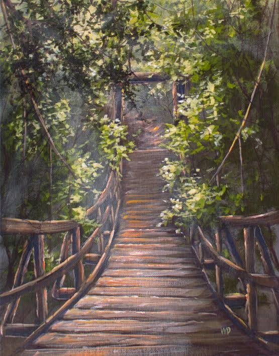 wooden bridge with green branches sun beams streaming in